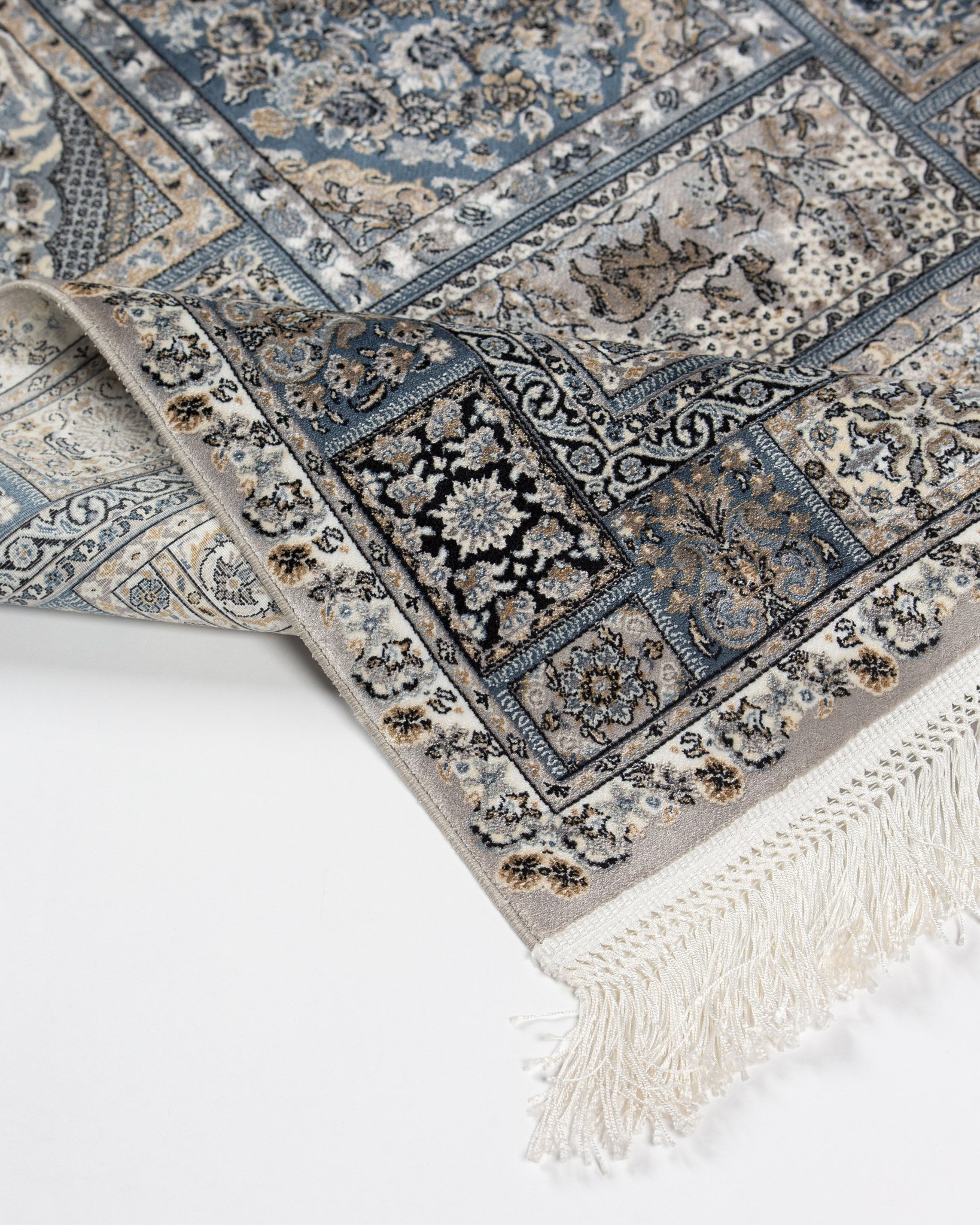 Reverse of the Golestan silk rug showing its fine weave