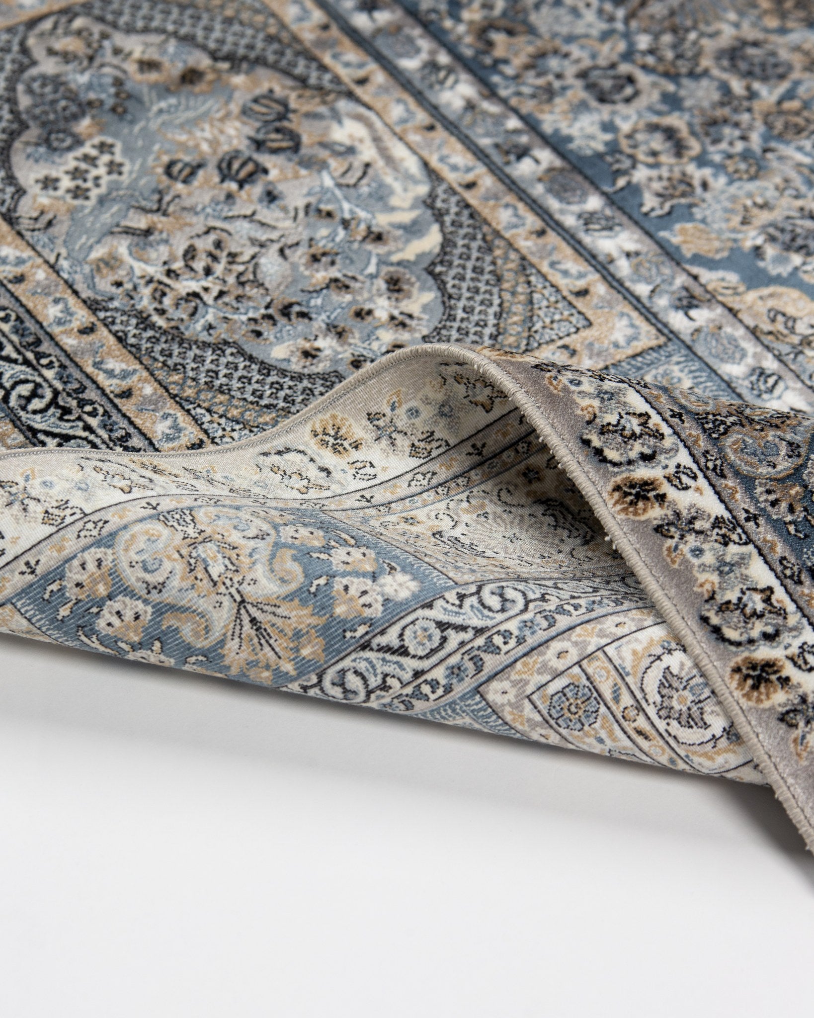 Angled corner of the Golestan silk rug