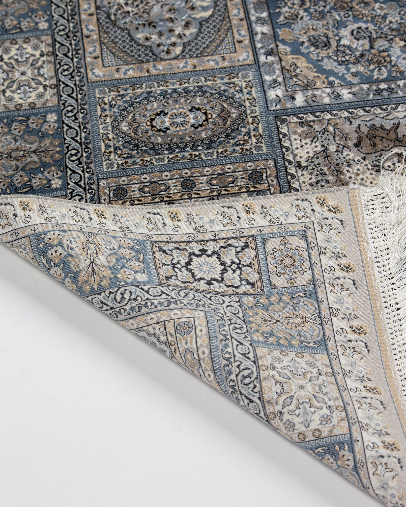 Golestan silver grey silk rug panel and border detail