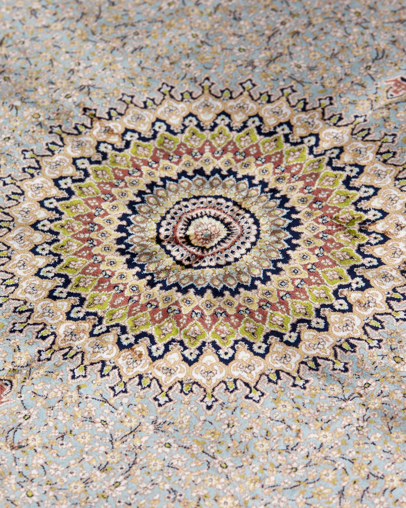 corner with silk fringe on the Celeste taupe silk rug