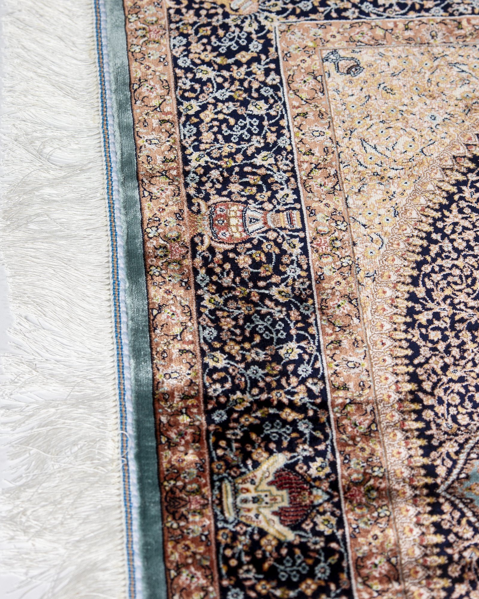 border pattern detail on the Celeste taupe silk rug