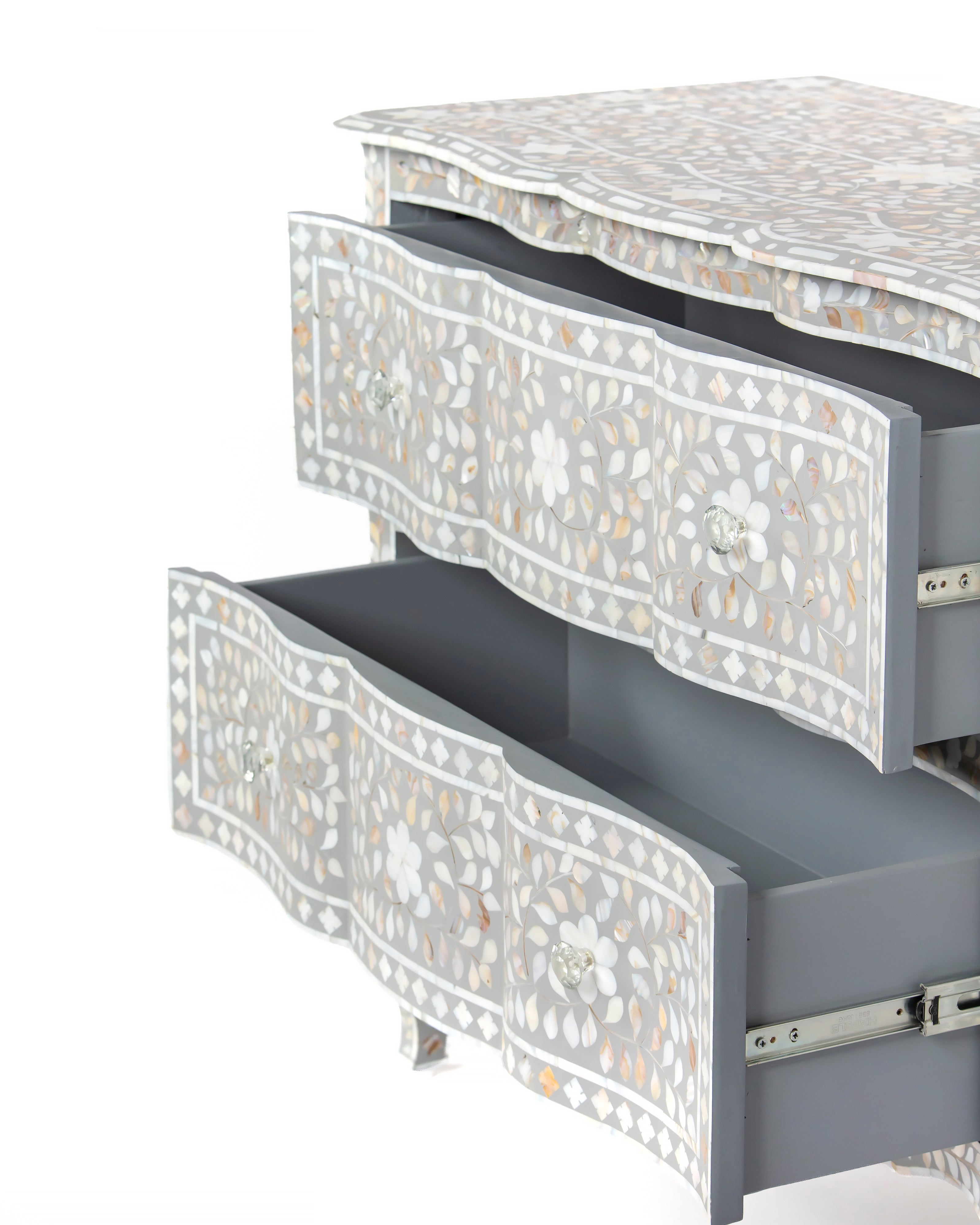 Angled view of Iris chest of drawers with both drawers open