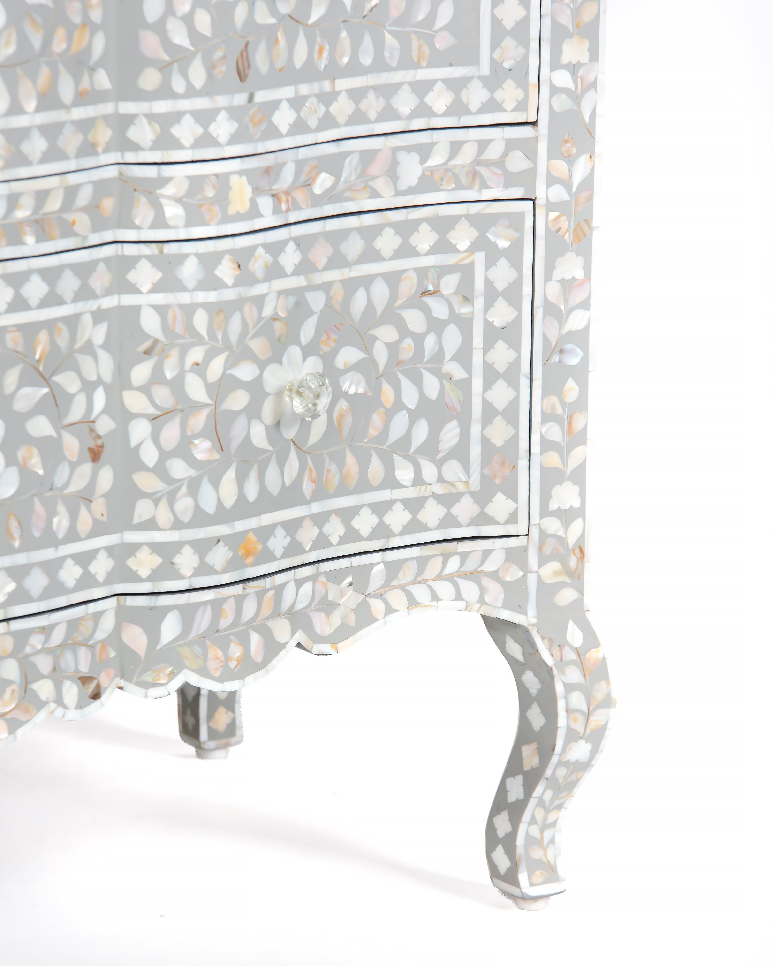 Scalloped apron and cabriole leg detail of grey mother of pearl chest