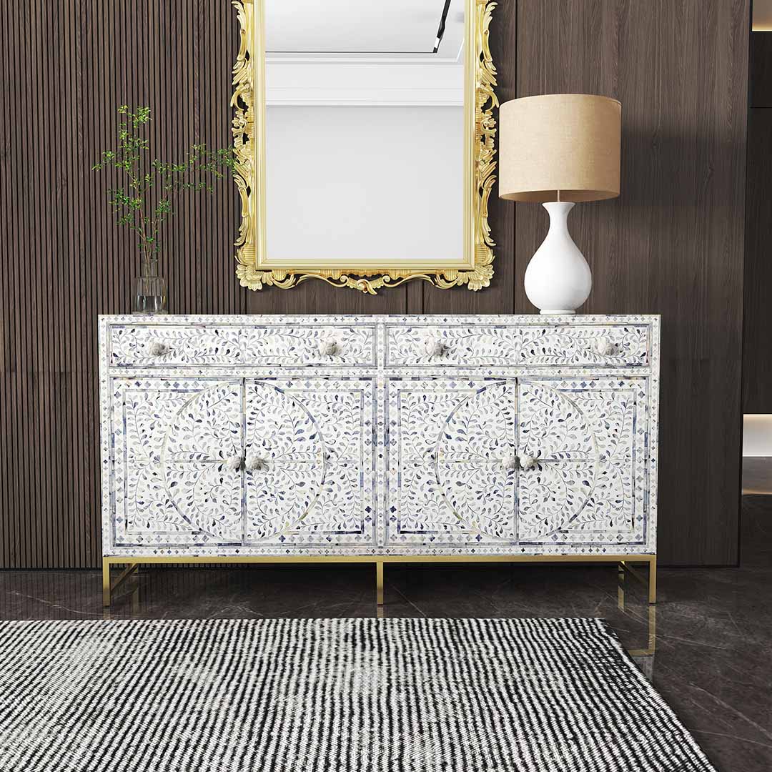 Jade sideboard buffet with blue bone inlay design, featuring intricate floral patterns and gold legs.