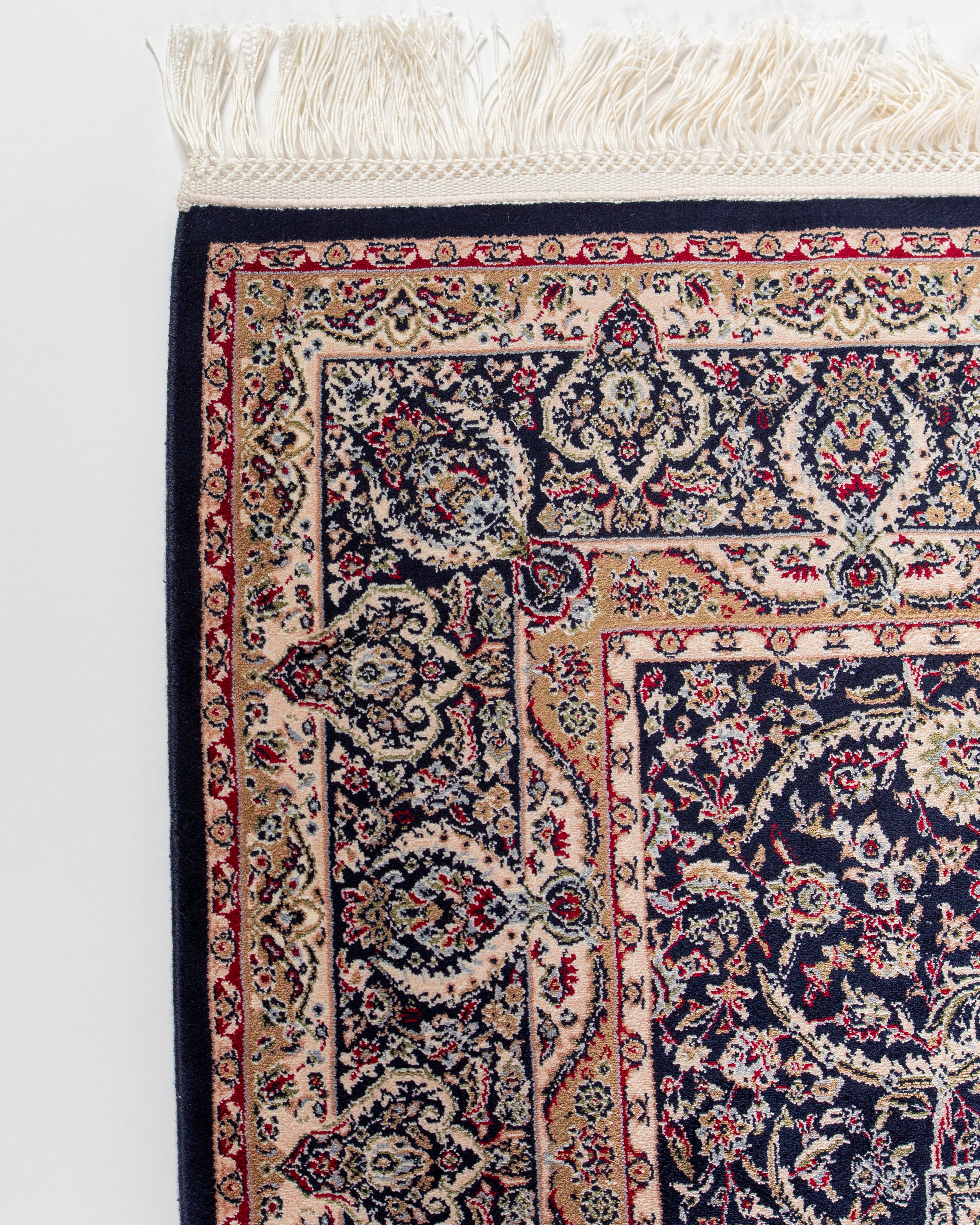 Ivory border and fringe corner of Layla silk rug