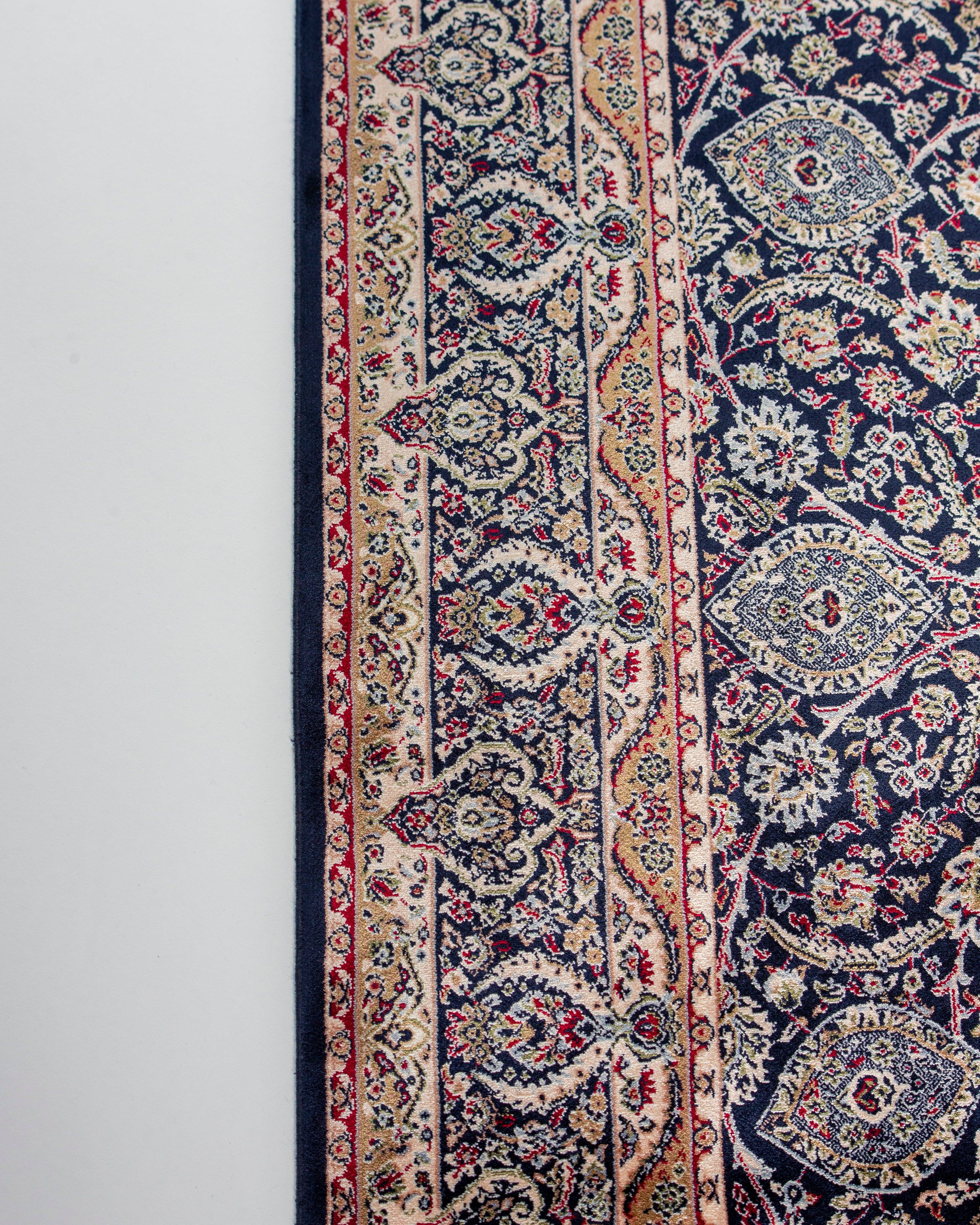 Persian border pattern detail of Layla navy silk rug