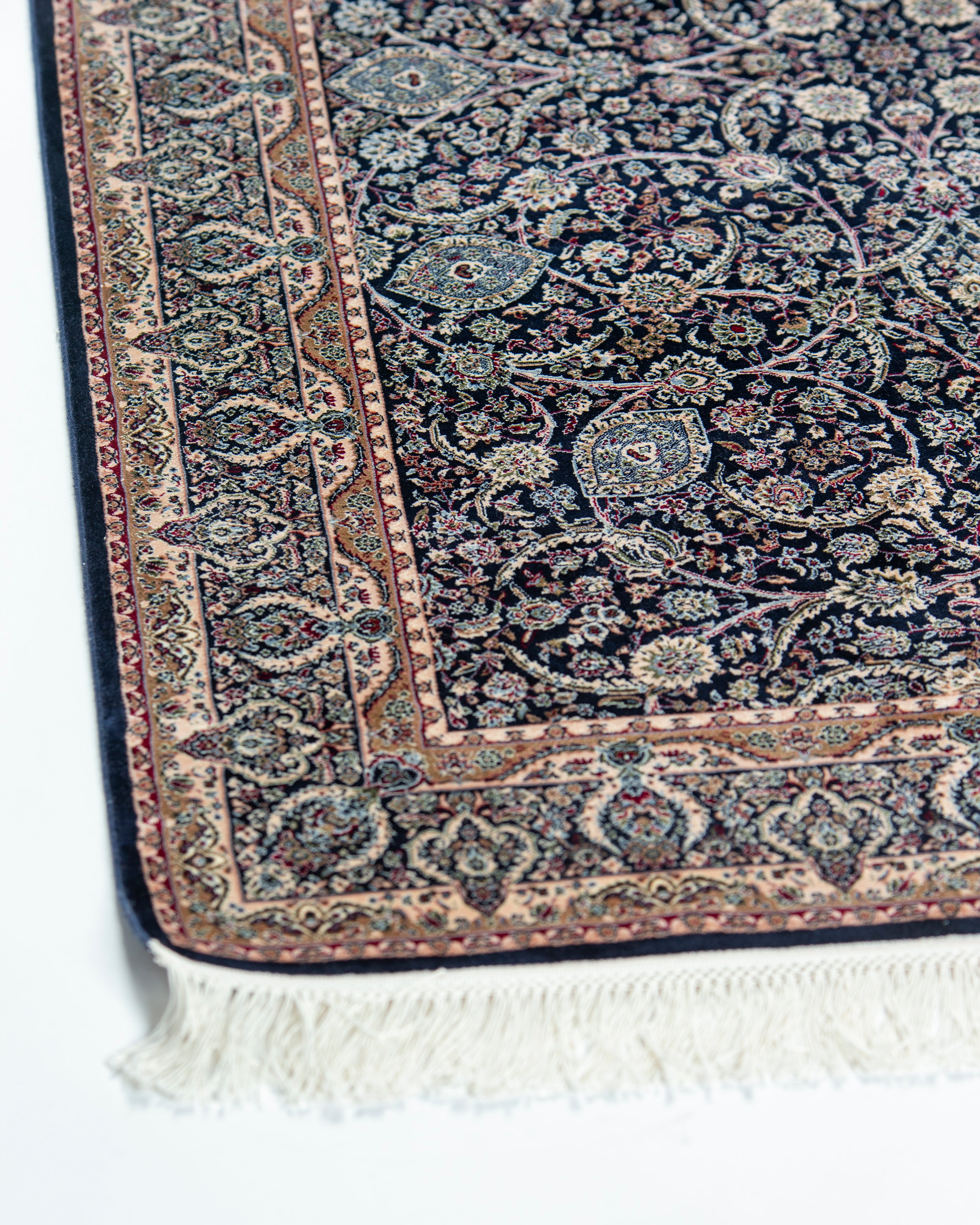 Corner and ivory border detail of Layla Persian silk rug with fringe
