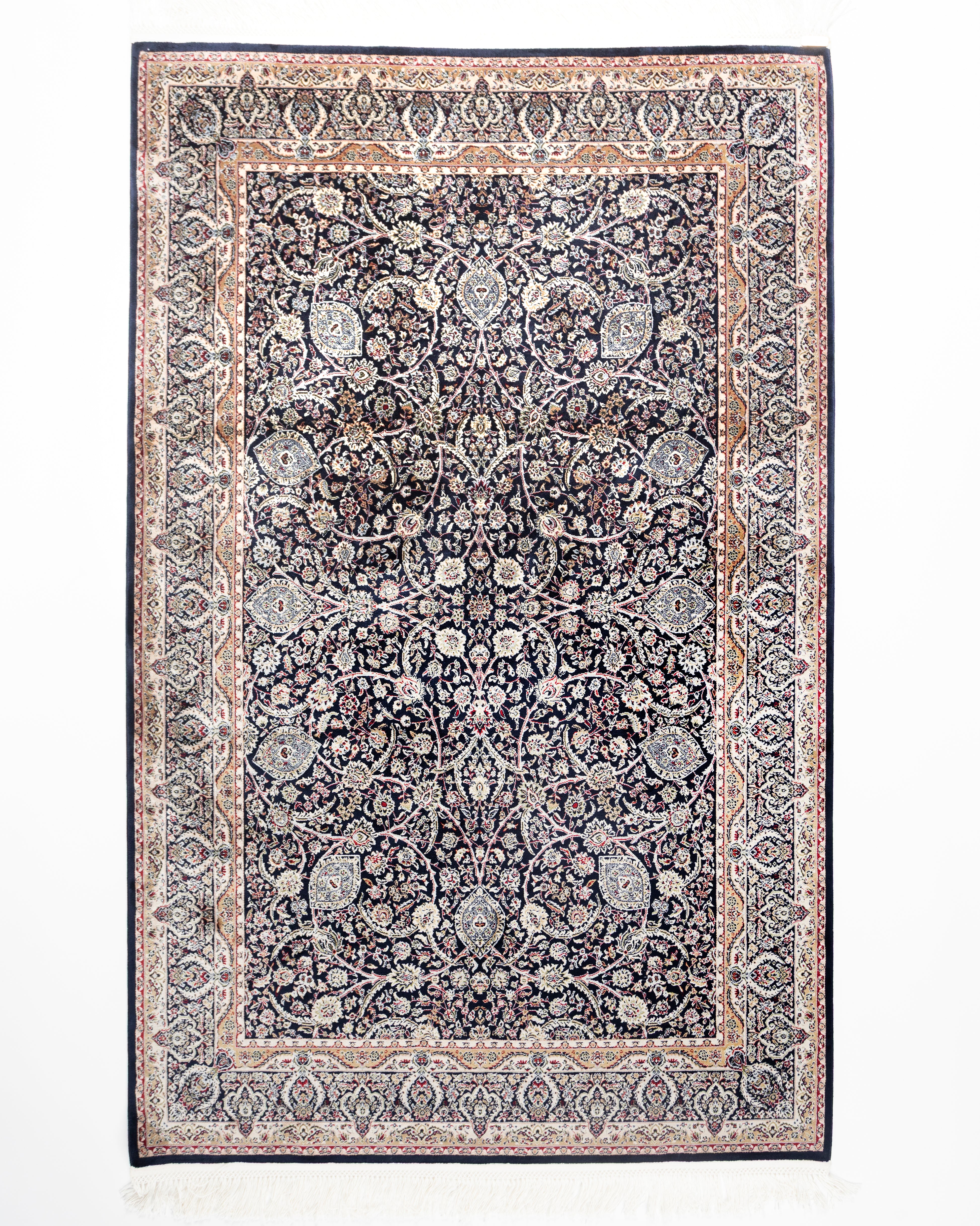 Layla navy blue silk rug with classic Persian floral design, full view