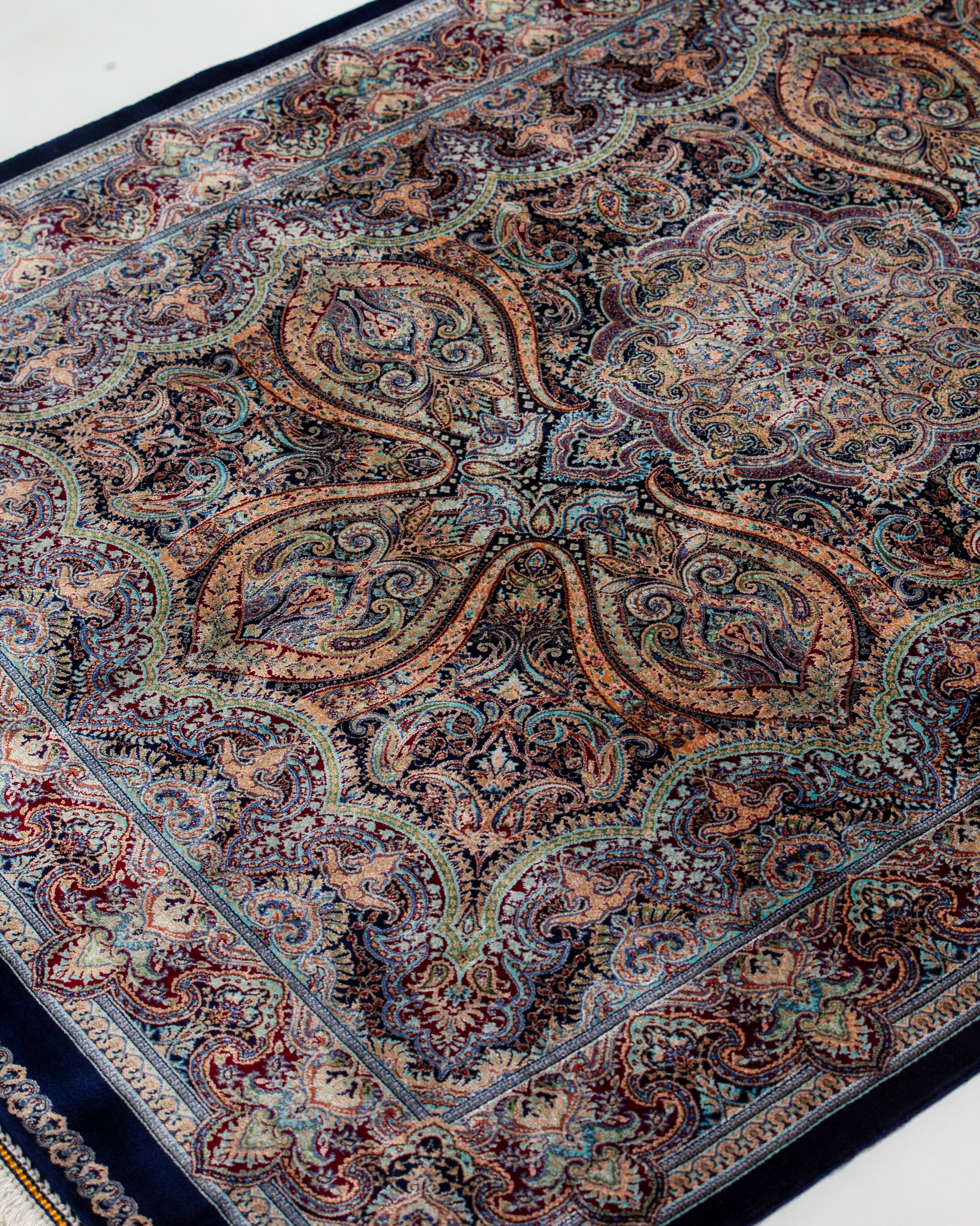 Angled view of the Mahtab grey silk rug
