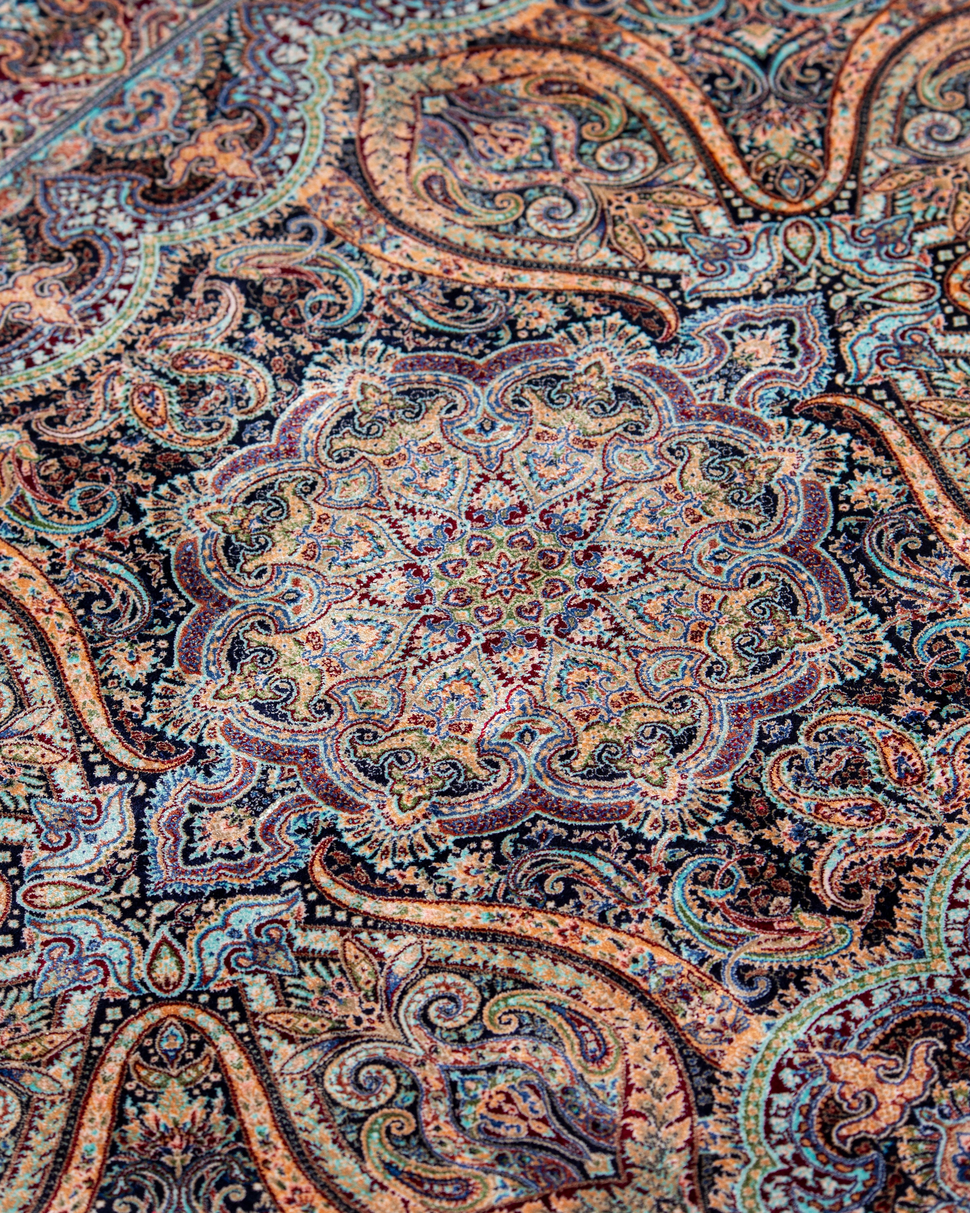 Paisley and floral field detail of the Mahtab silk rug