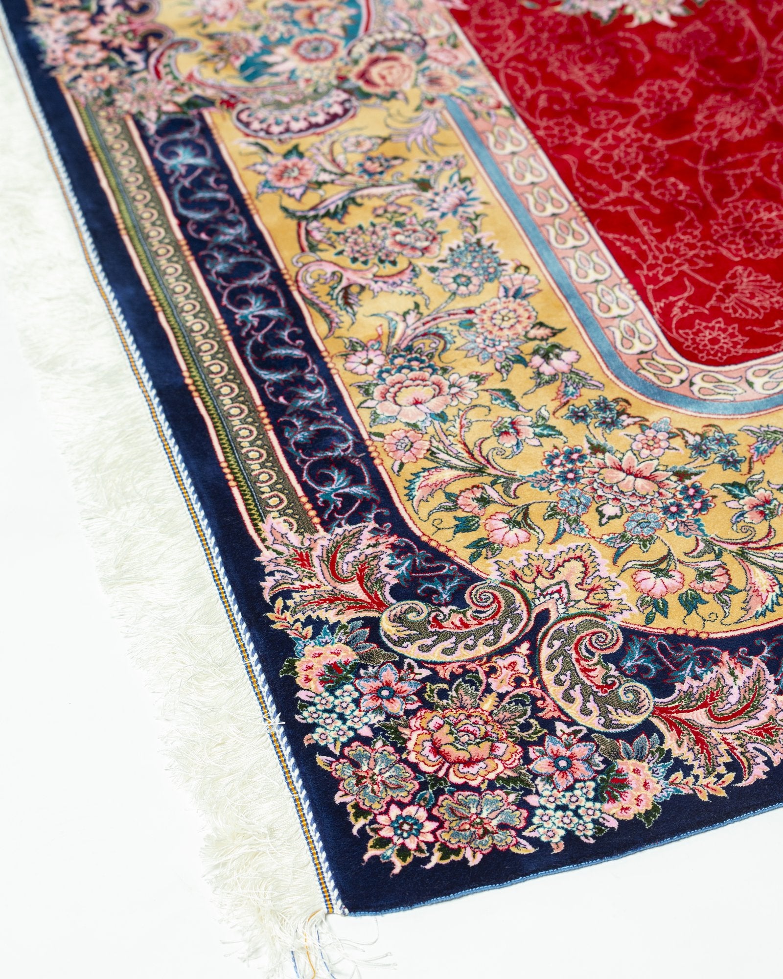 Marguerite silk carpet angled view showing red and ivory tones, 200 x 300 cm - Tabeer Homes Dubai