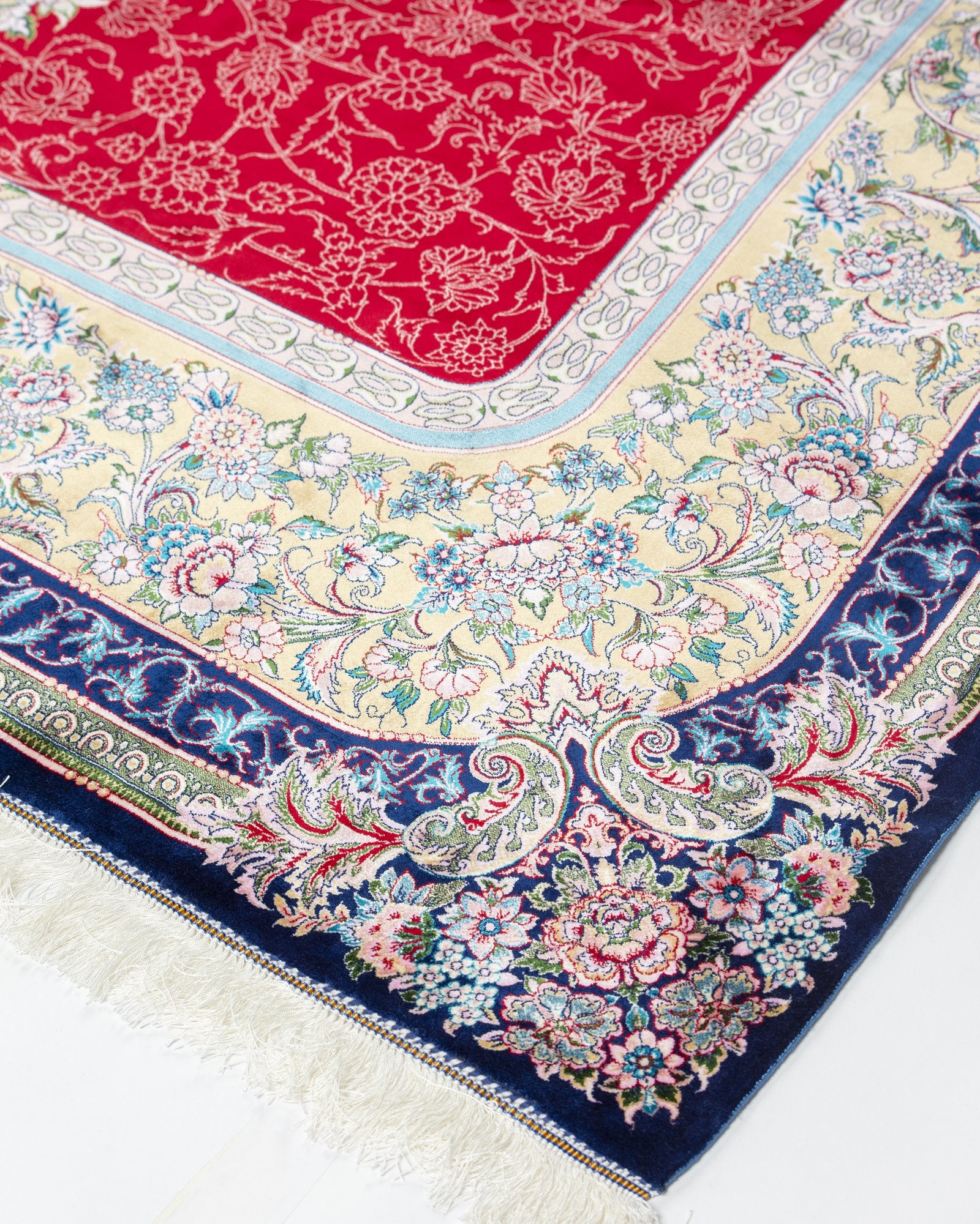 Marguerite Persian silk rug folded corner showing fine weave, red and ivory 200 x 300 cm - Tabeer Homes Dubai