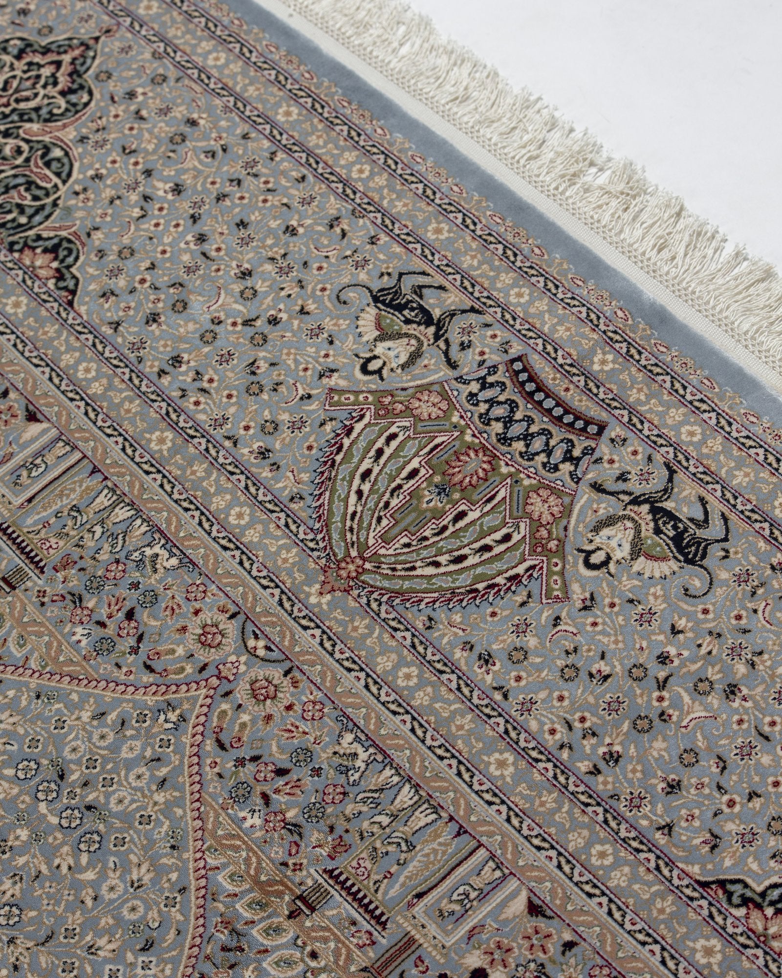 Mehrnaz Persian silk rug folded corner showing fine weave, silver grey 200 x 300 cm - Tabeer Homes Dubai