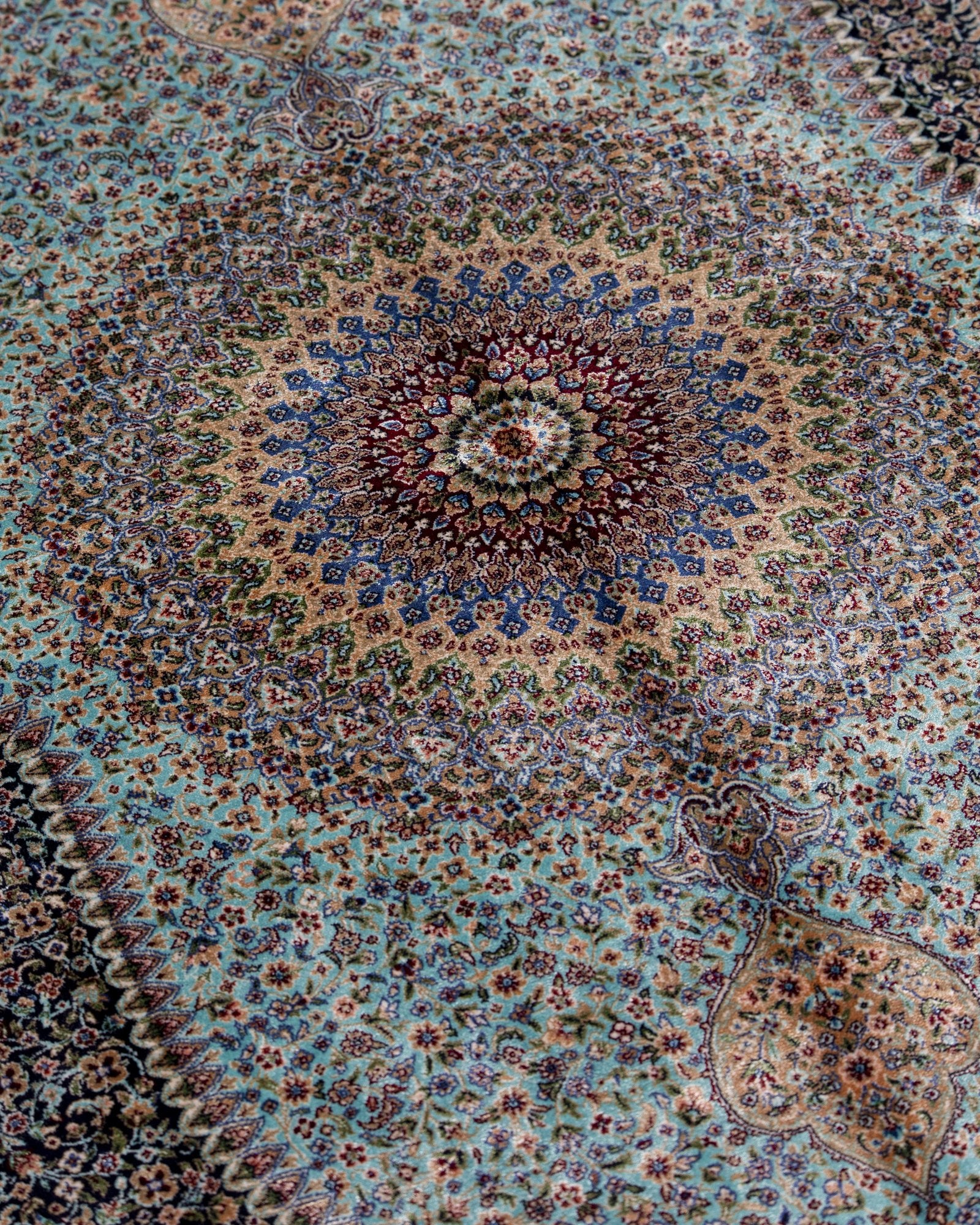 border and field detail on the Nasrin blue silk rug