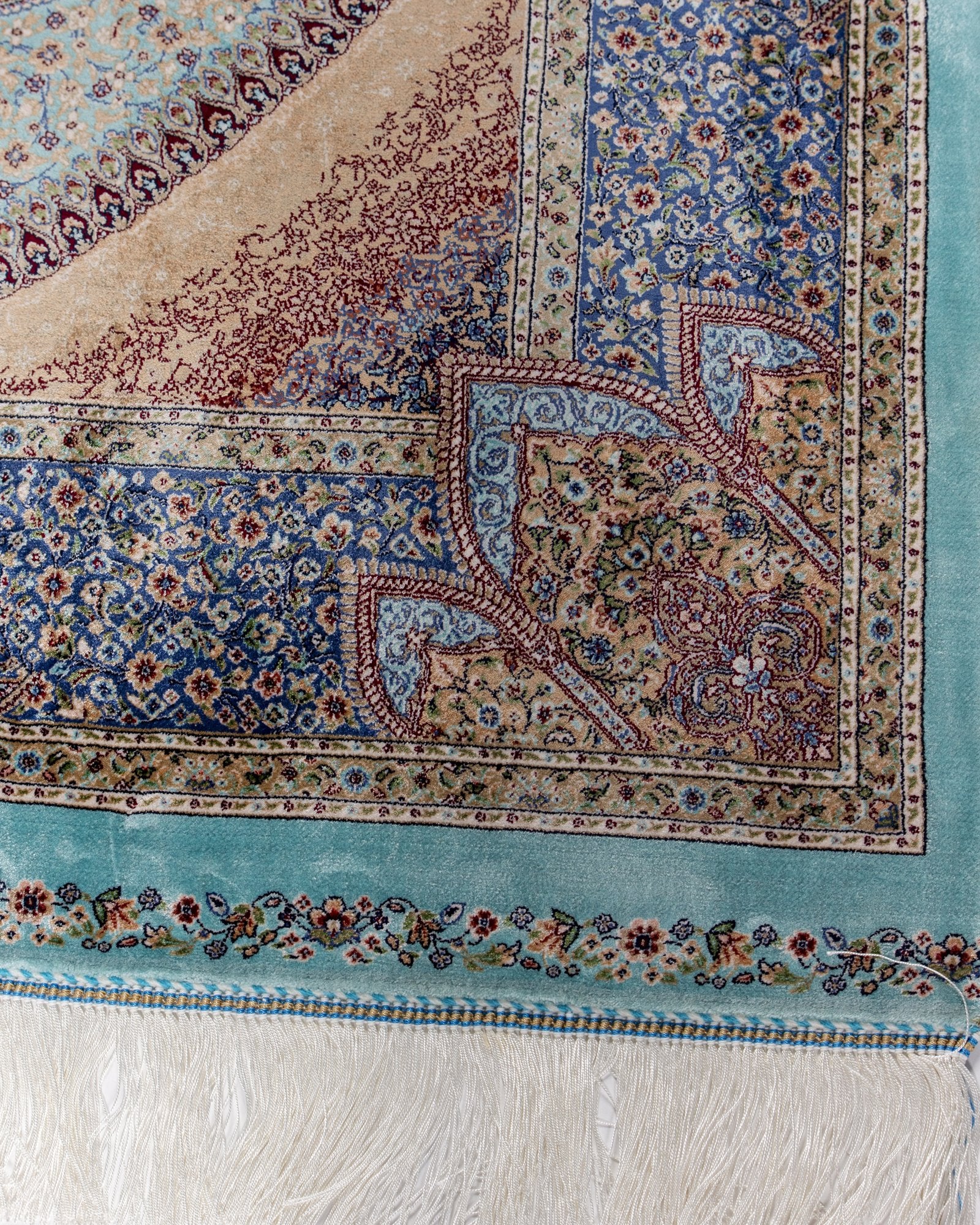 border pattern detail on the Nasrin blue silk rug