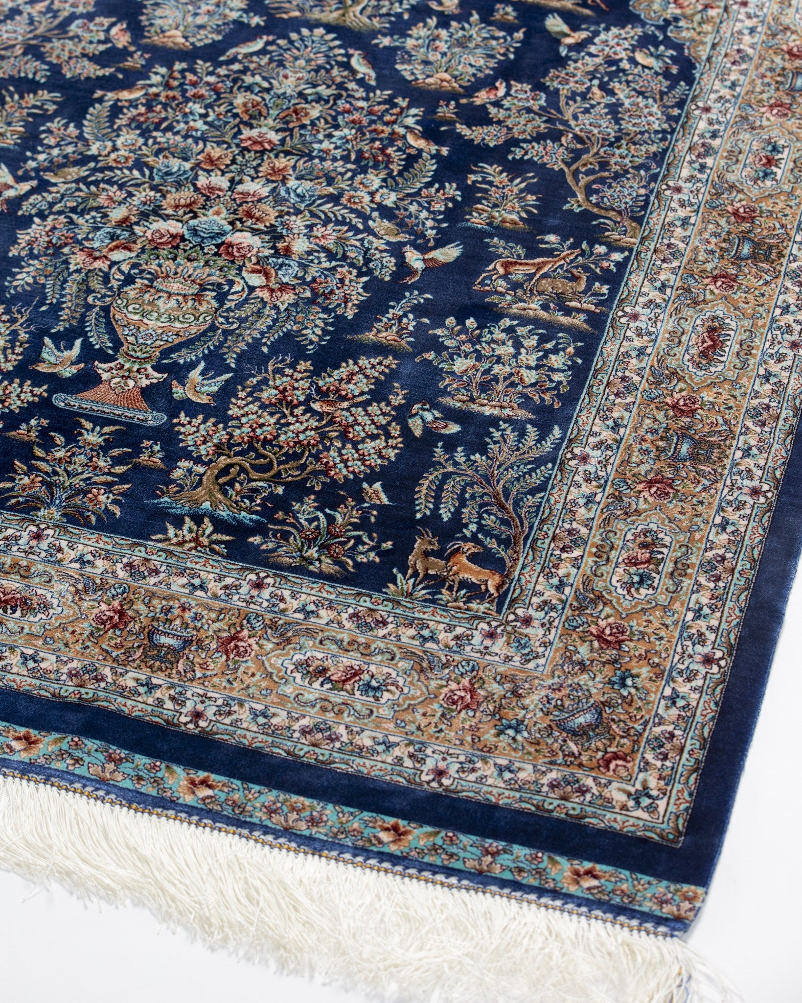 Border detail of the Nilofar blue silk rug