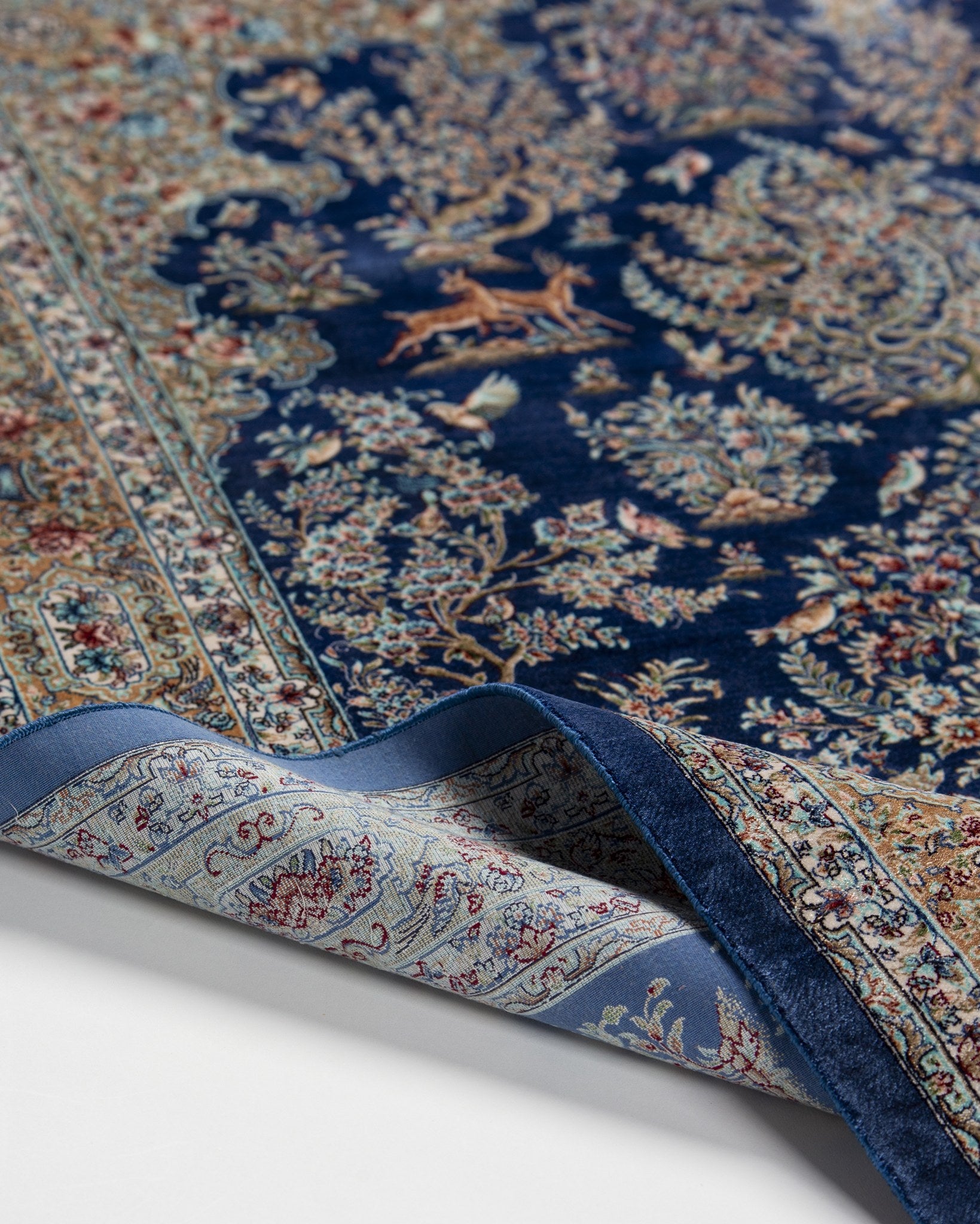 Nilofar silk rug field with fine floral motifs