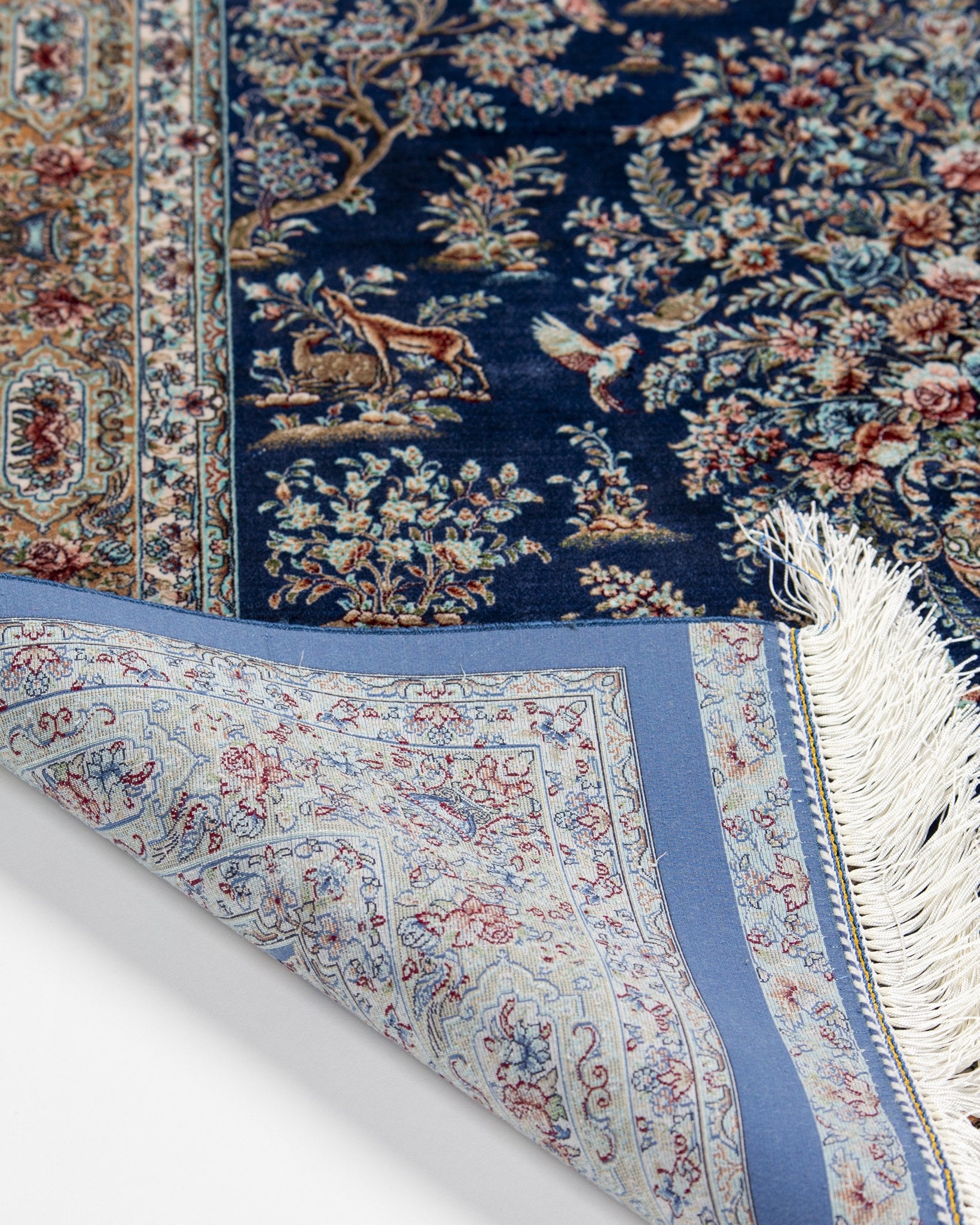 Reverse of the Nilofar silk rug showing its fine weave