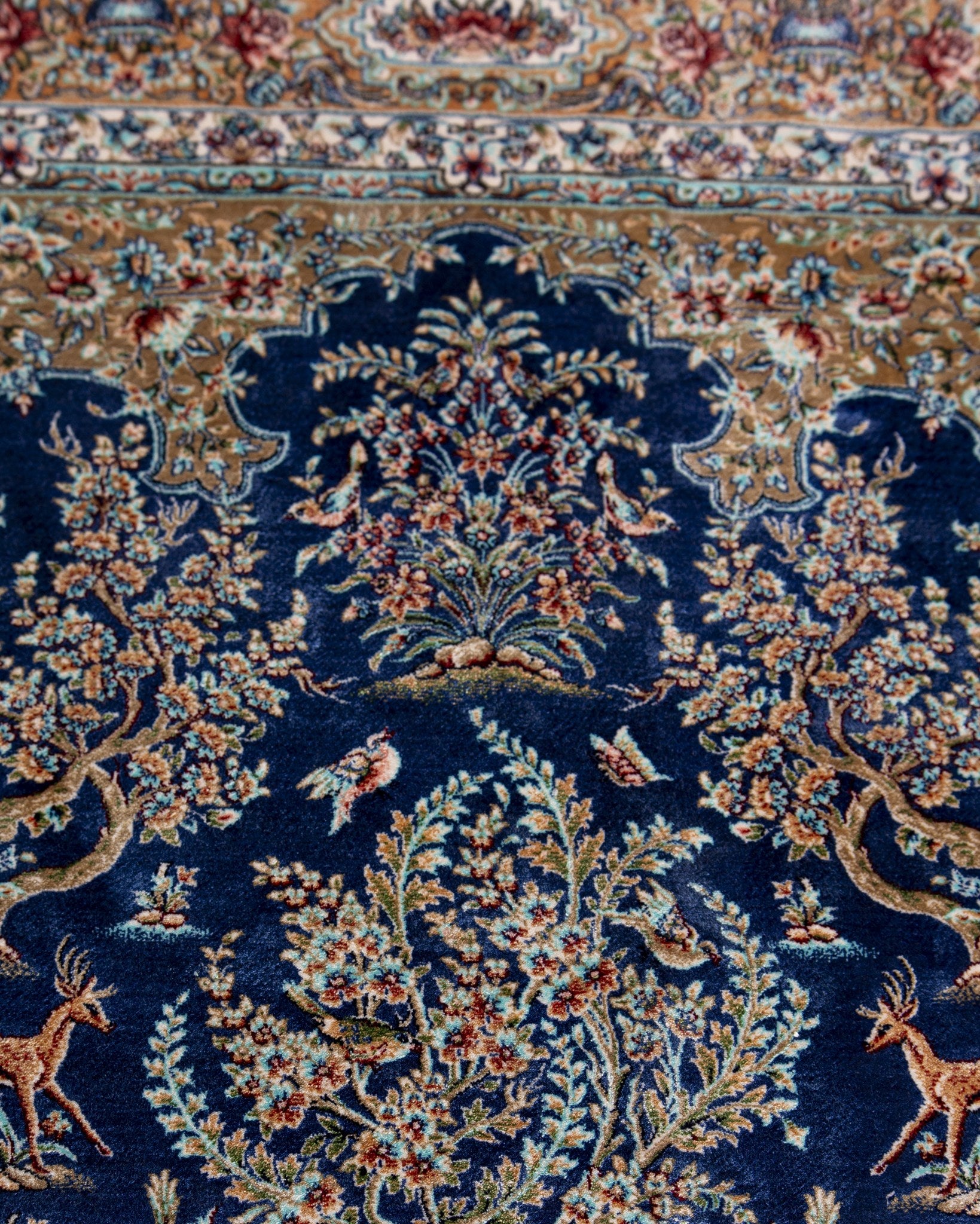 Nilofar blue silk rug motif detail in blue and ivory silk
