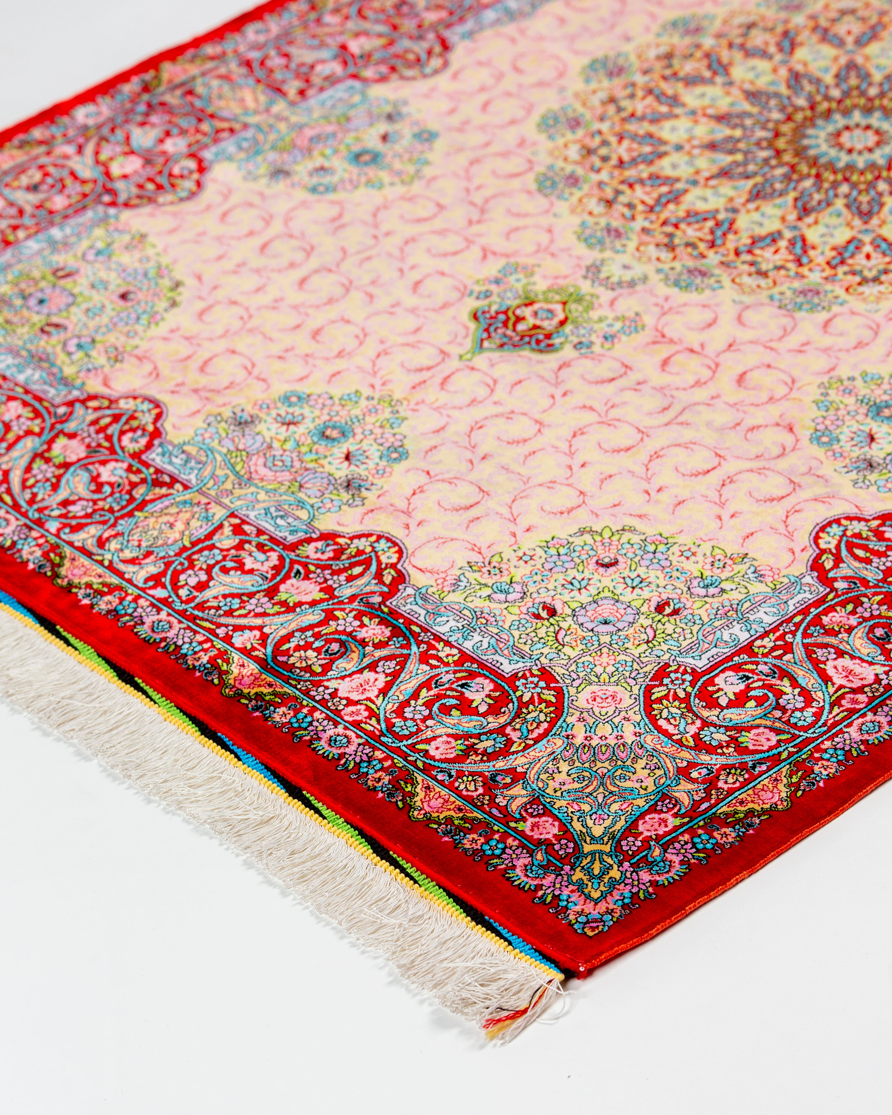 Corner and fringe of the Noor coral silk rug