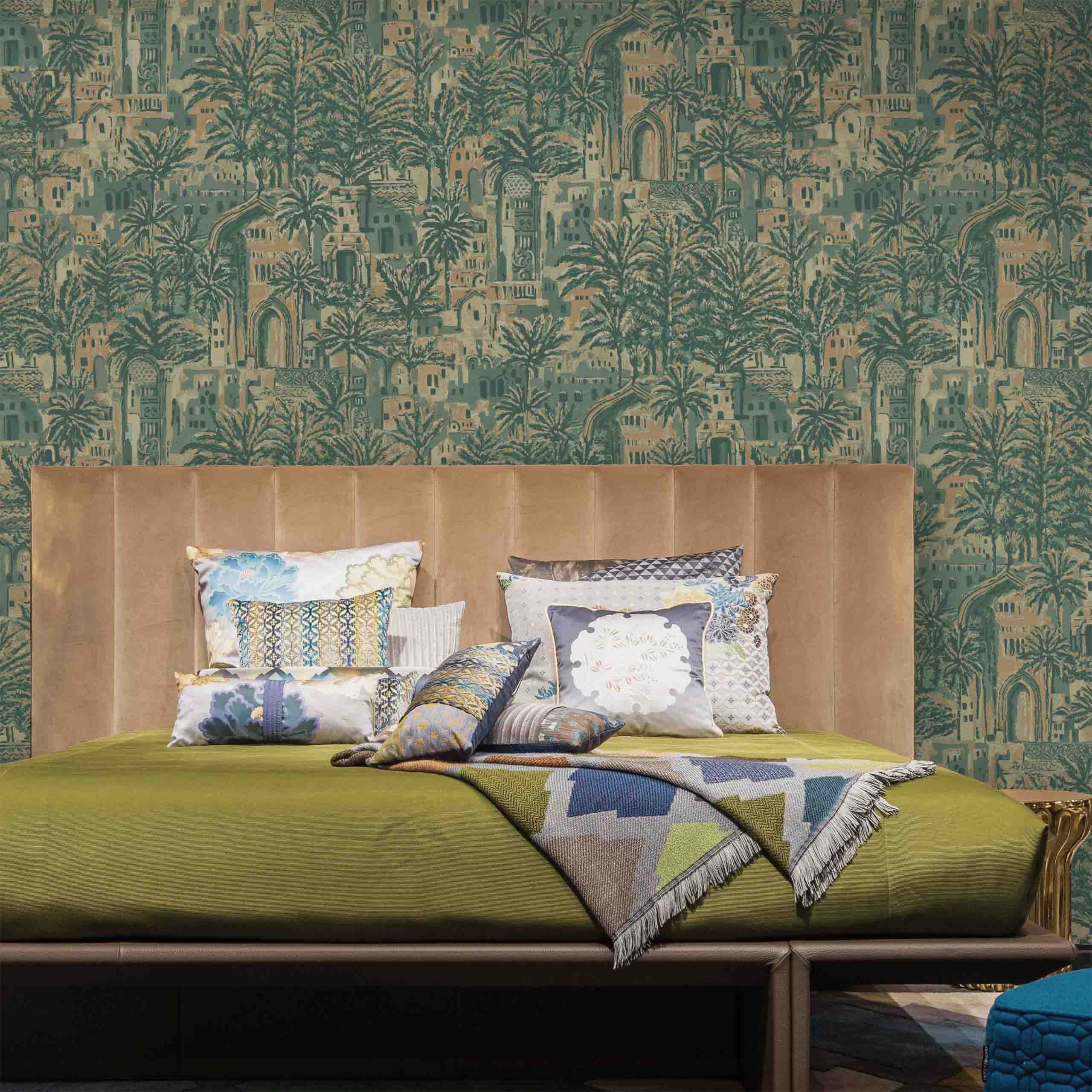 Room view of Oasis botanical wallpaper in dark green tones showcasing intricate architectural and palm tree patterns.