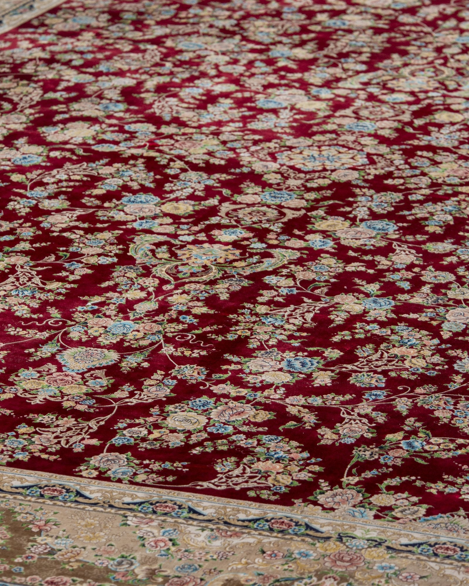 Octavia silk carpet floral motif close-up in deep red, 300 x 400 cm - Tabeer Homes Dubai