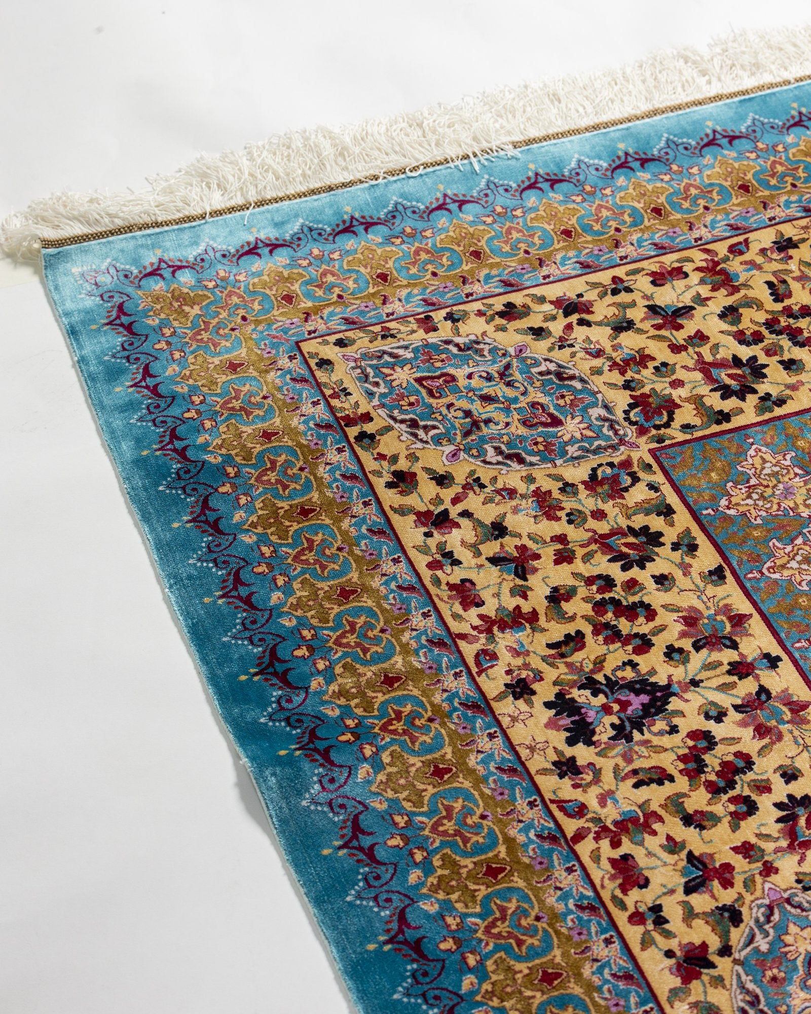 Ophira silk carpet floral motif close-up in turquoise and gold, 250 x 350 cm - Tabeer Homes Dubai