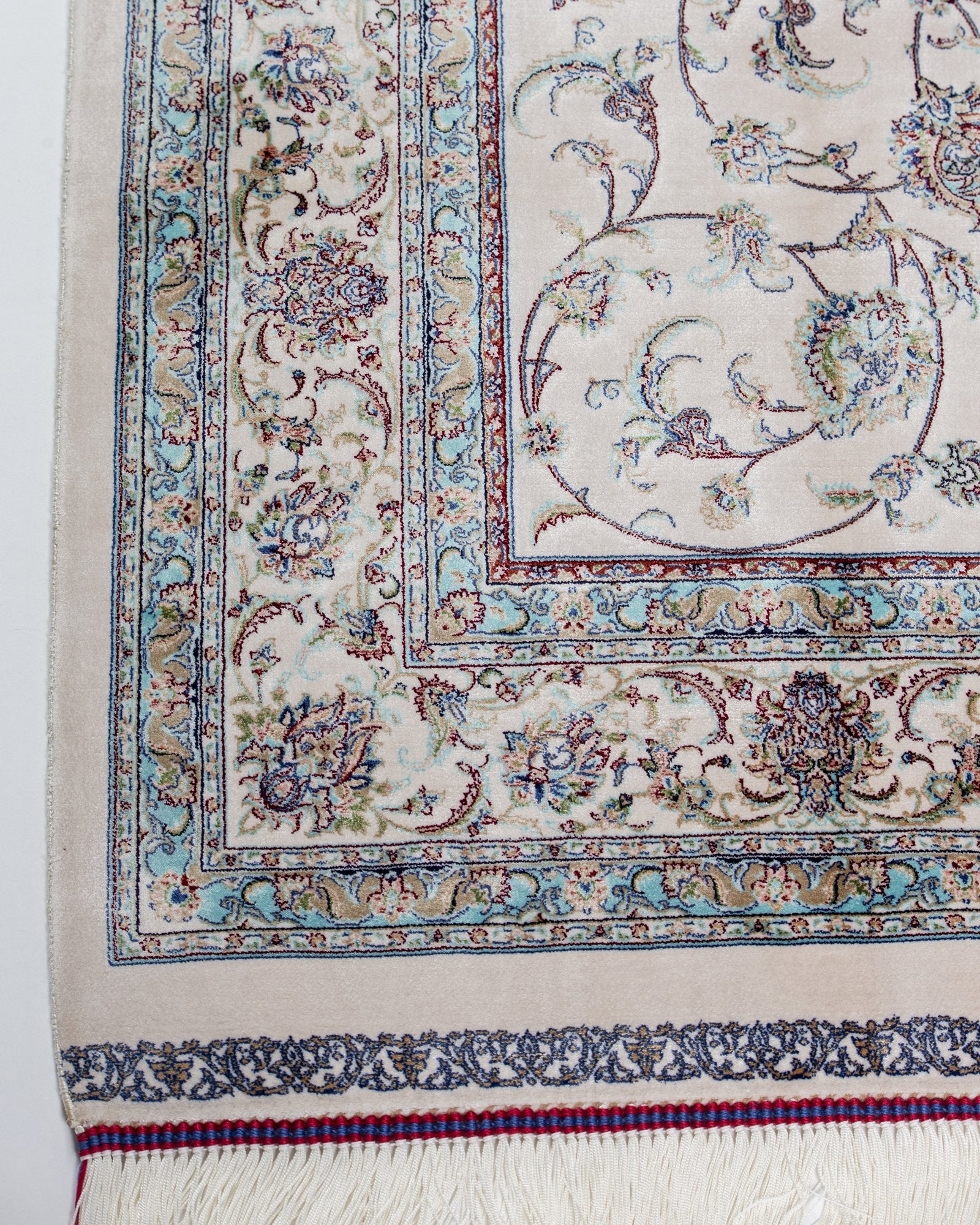 reverse showing the fine silk weave on the Parisa ivory silk rug