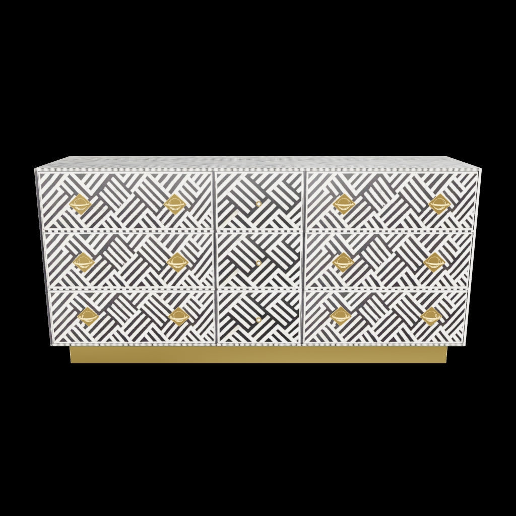 Luxury black and white bone inlay chest of drawers with brass accents and geometric design, handcrafted for statement interiors.