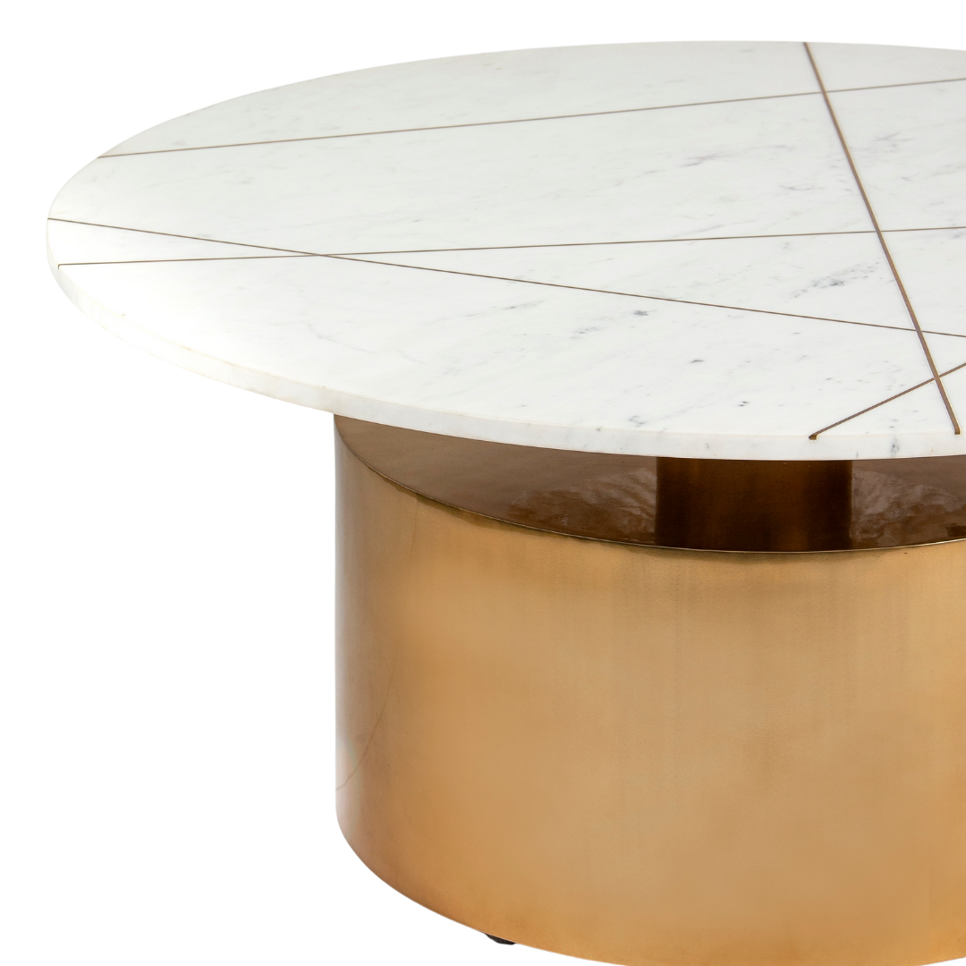 White marble coffee table with golden cylindrical base and linear inlay accents