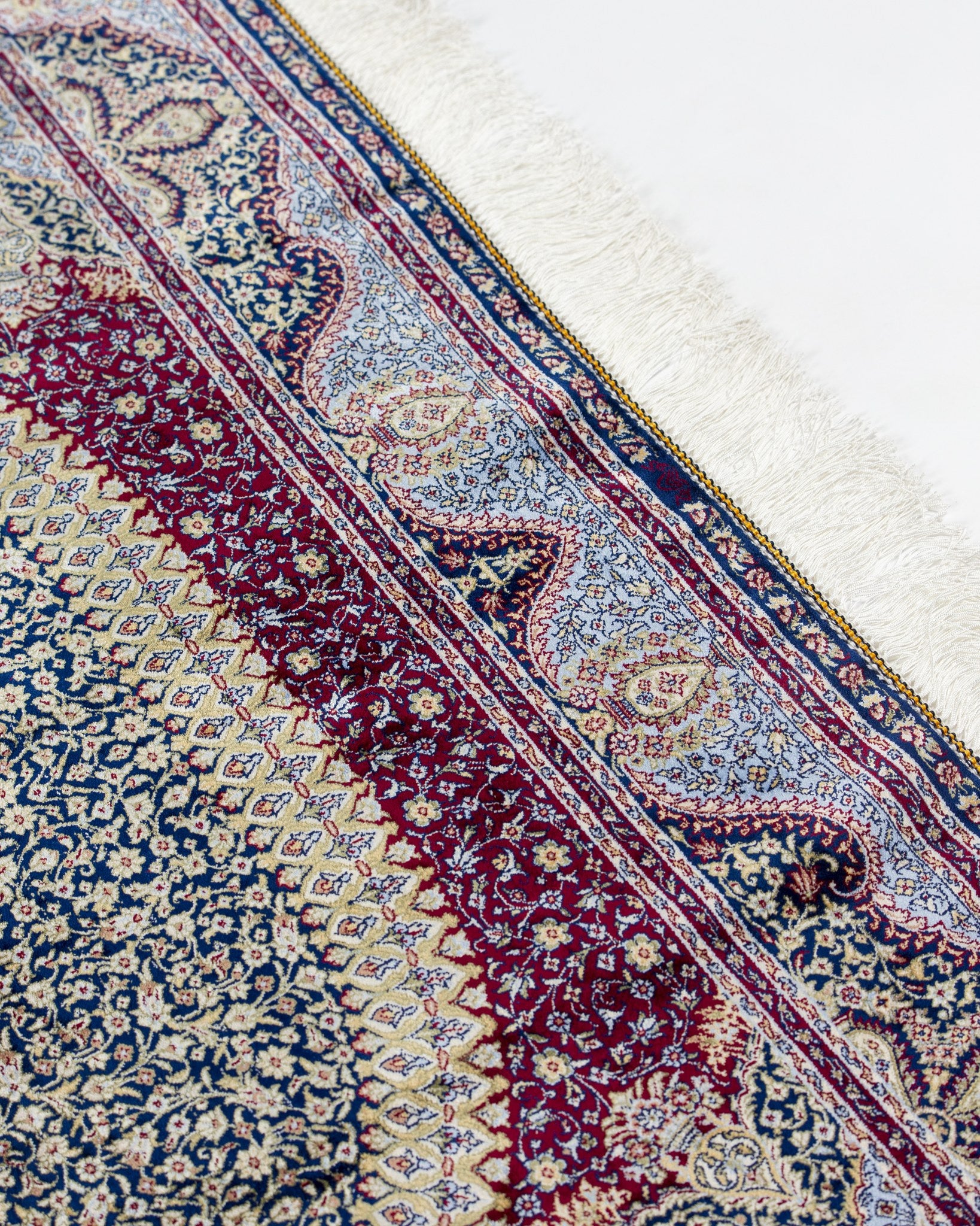 Border pattern detail of the Roya silk rug