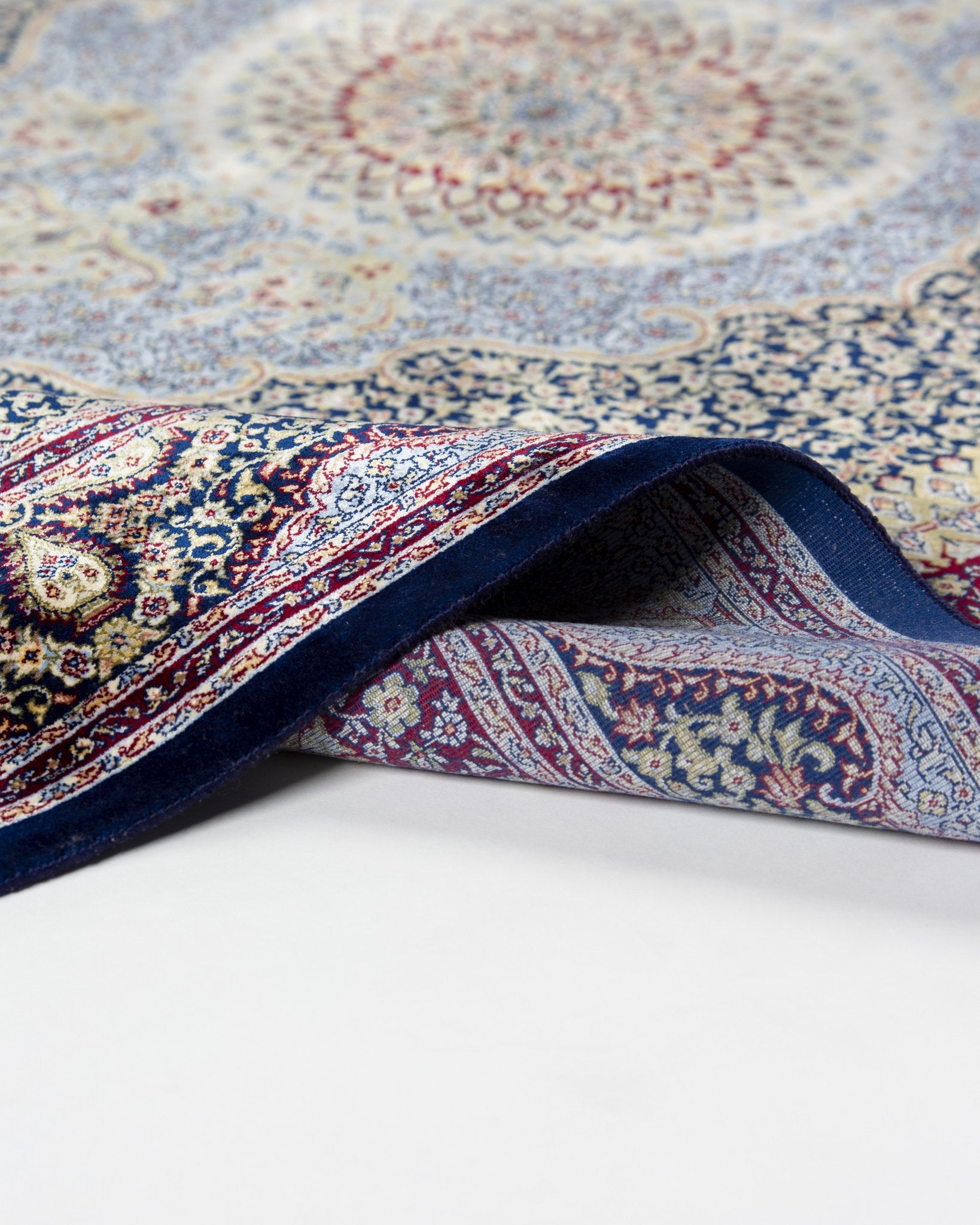 Reverse of the Roya silk rug showing its fine weave