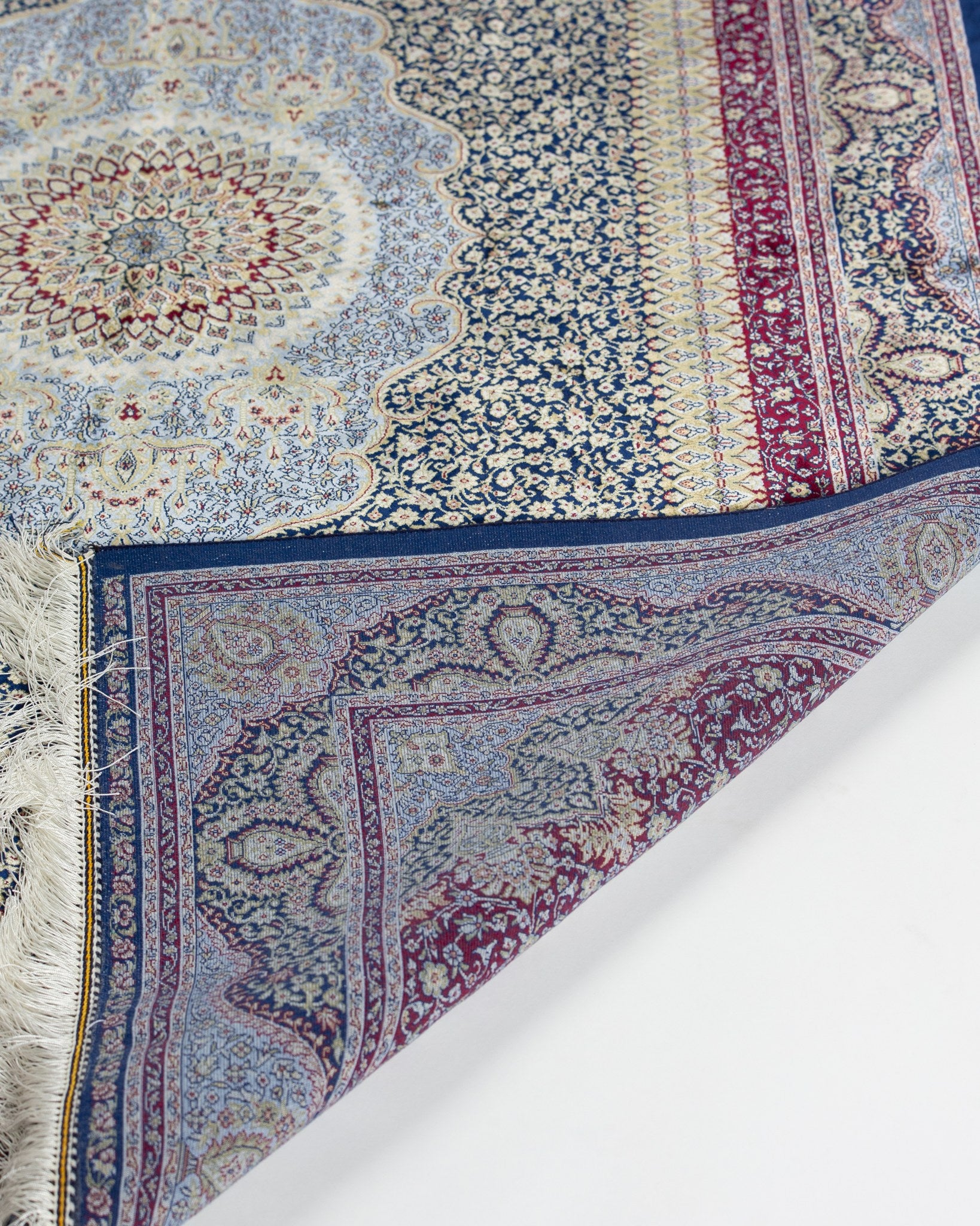 Roya sage green silk rug corner detail