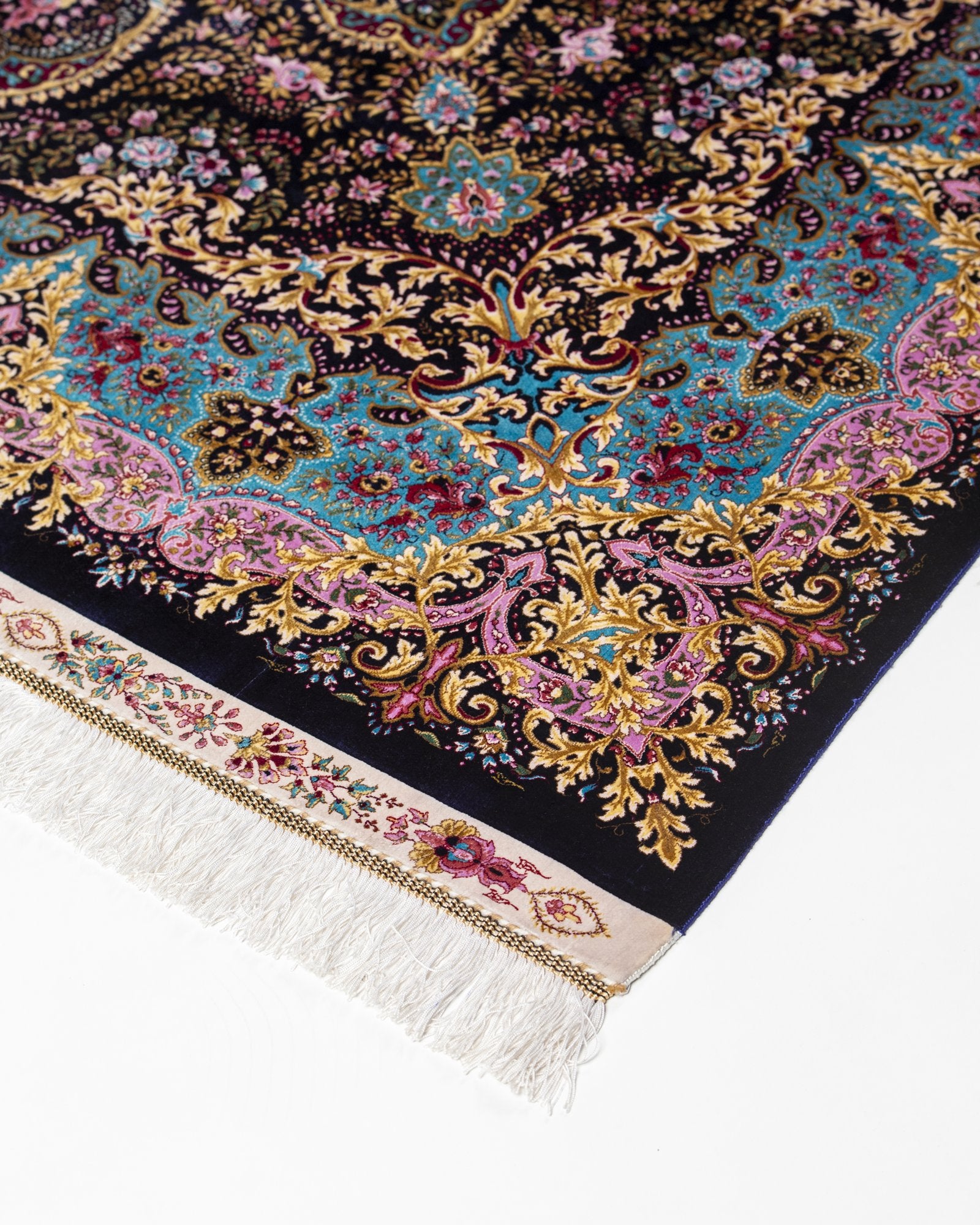 detail of the paisley design on the Selene charcoal silk rug