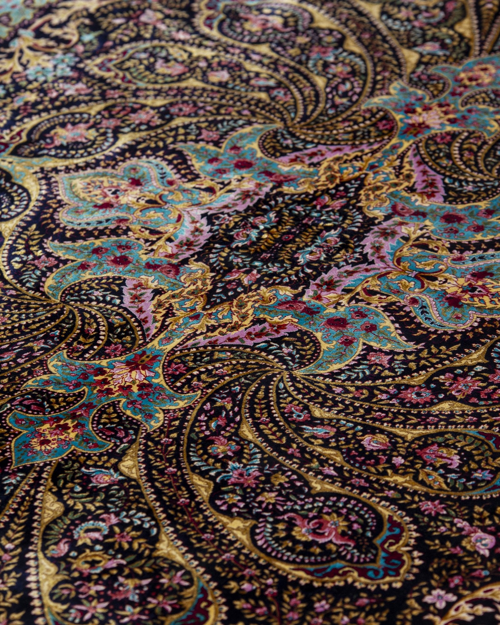 border and field detail on the Selene charcoal silk rug