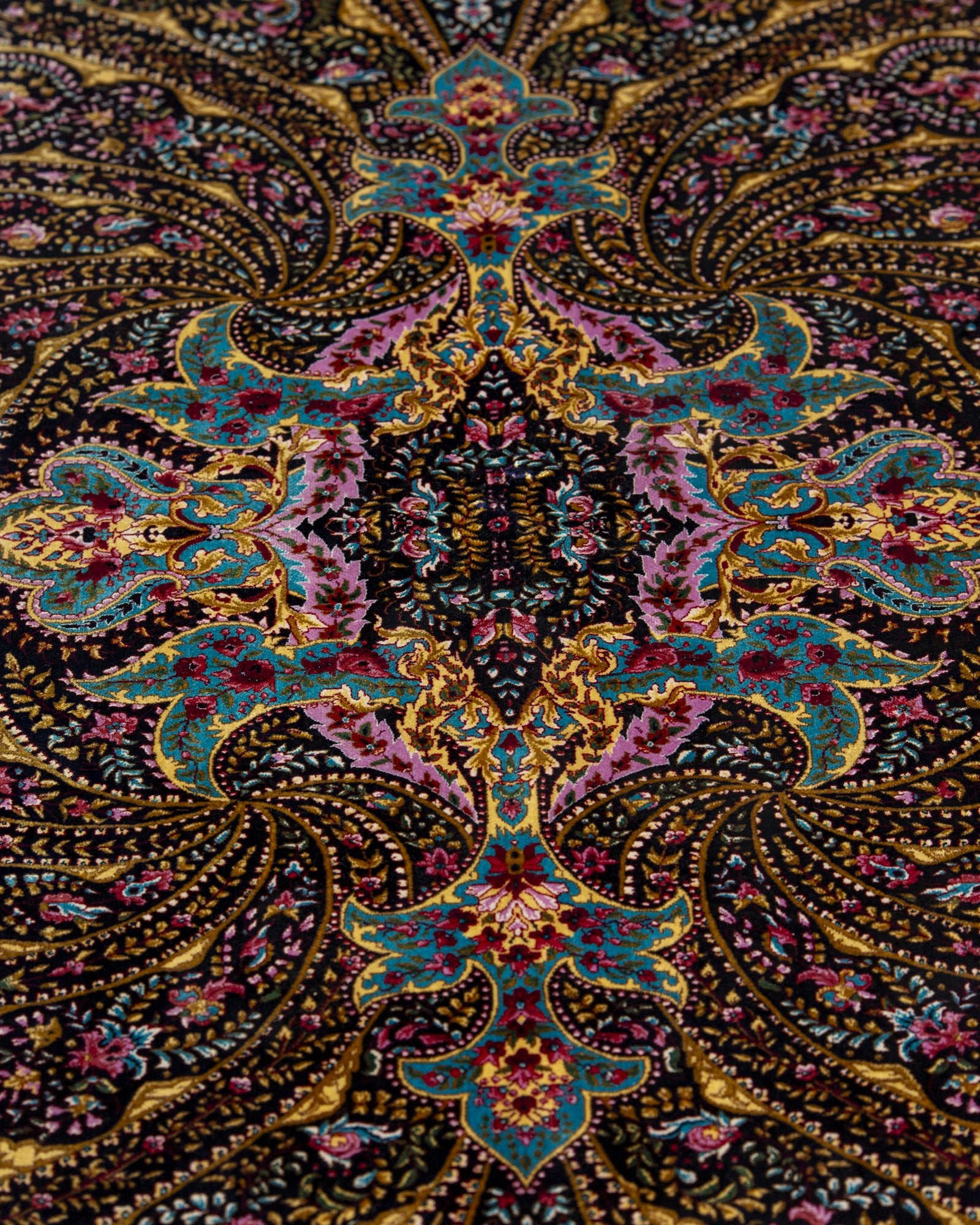 corner with silk fringe on the Selene charcoal silk rug