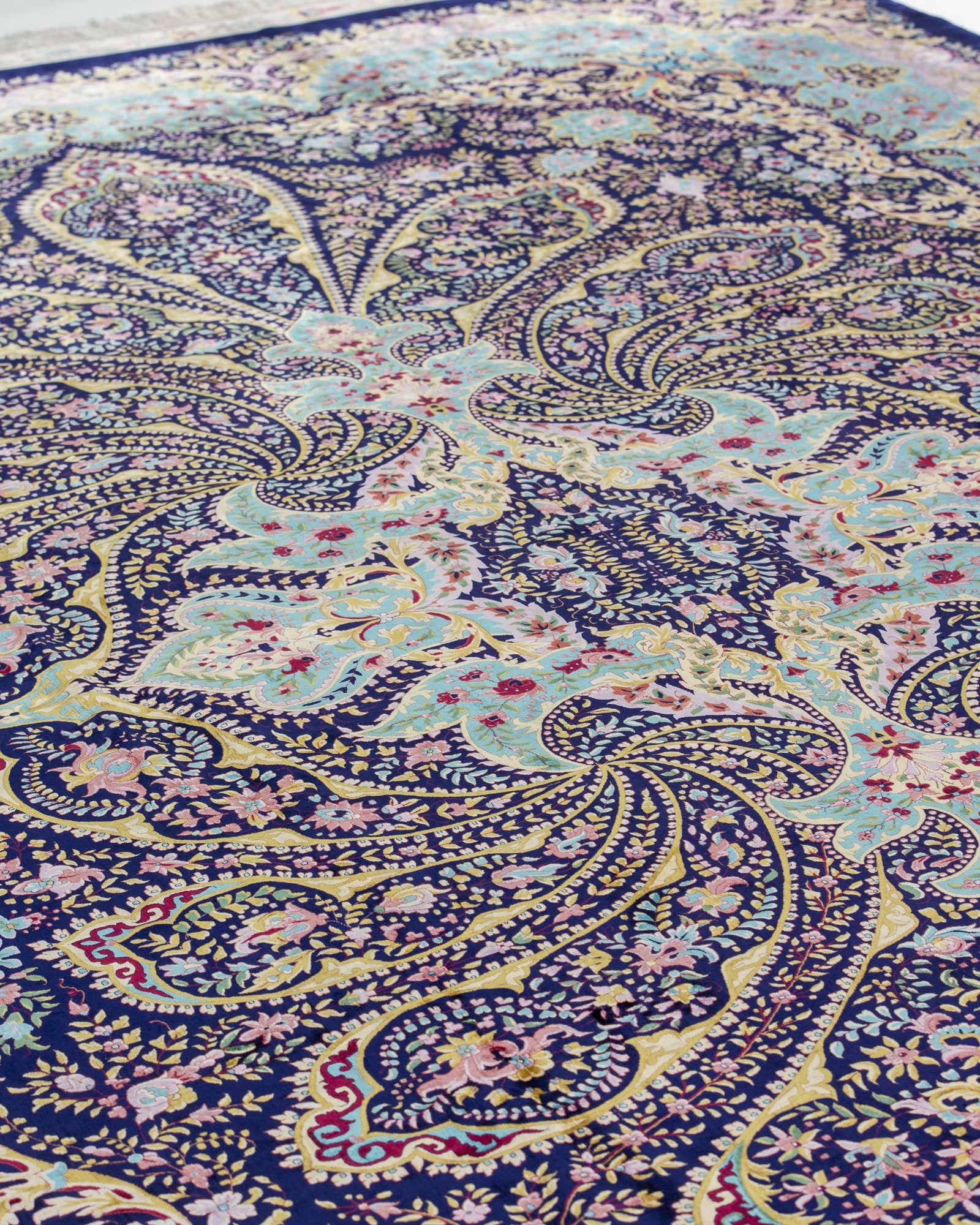 Serafina Persian silk rug folded corner showing fine weave, navy and sky blue 300 x 400 cm - Tabeer Homes Dubai