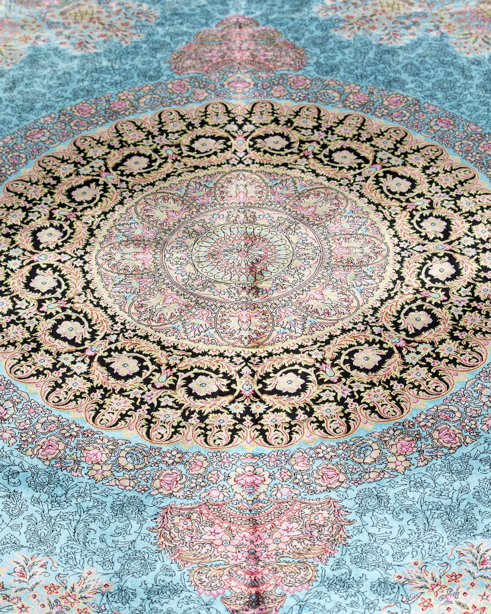 detail of the oval medallion on the Serena turquoise silk rug