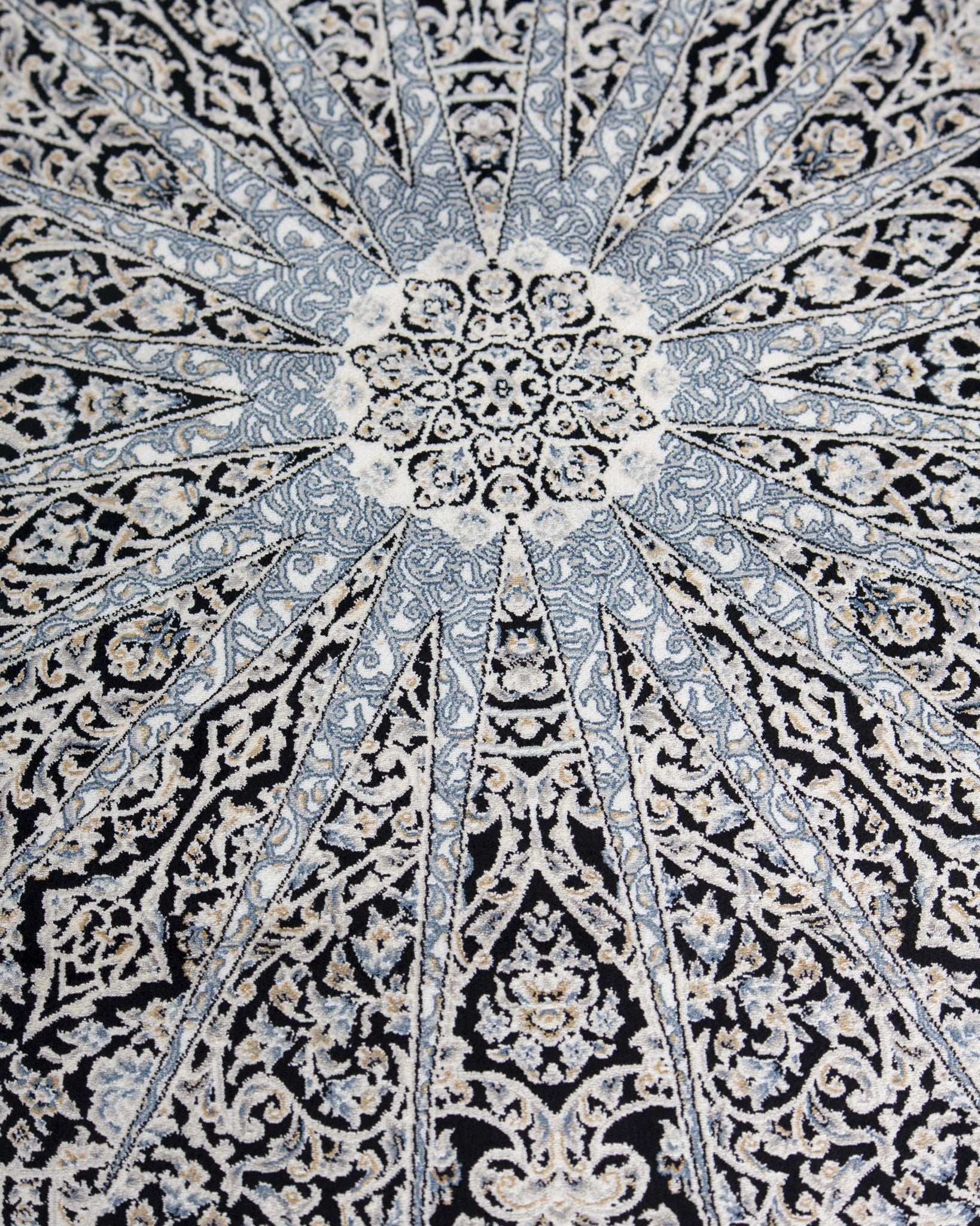 Corner and border of the Shabnam black silk rug with silk fringe