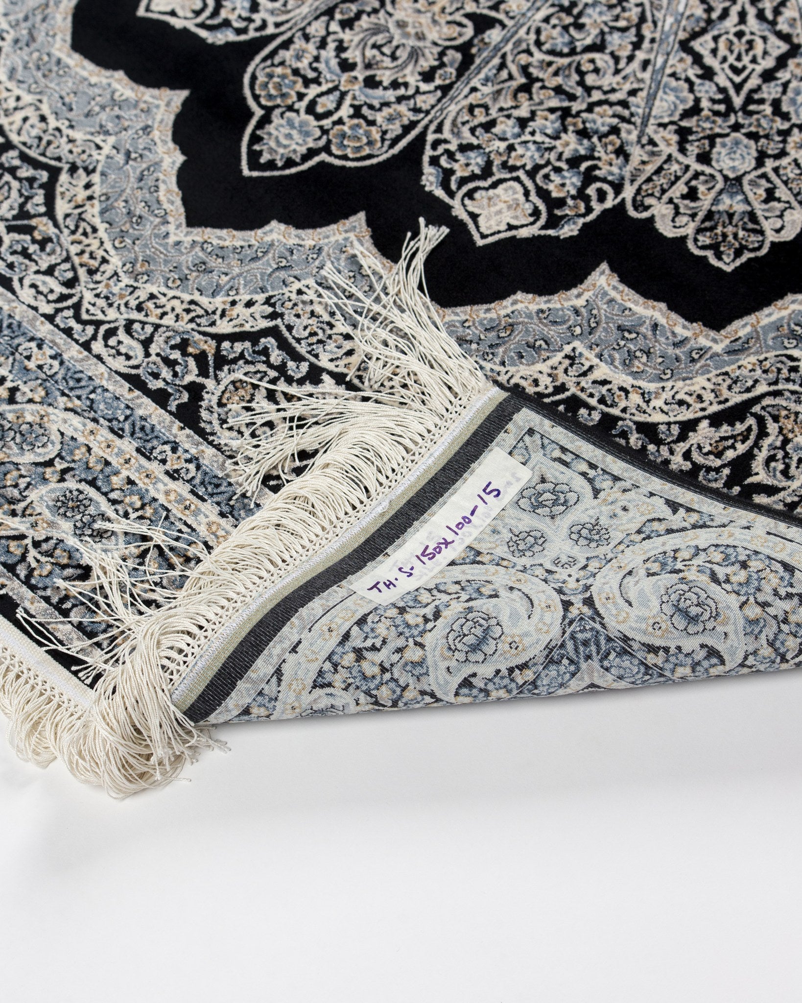 Shabnam black silk rug pattern detail in silver and ivory