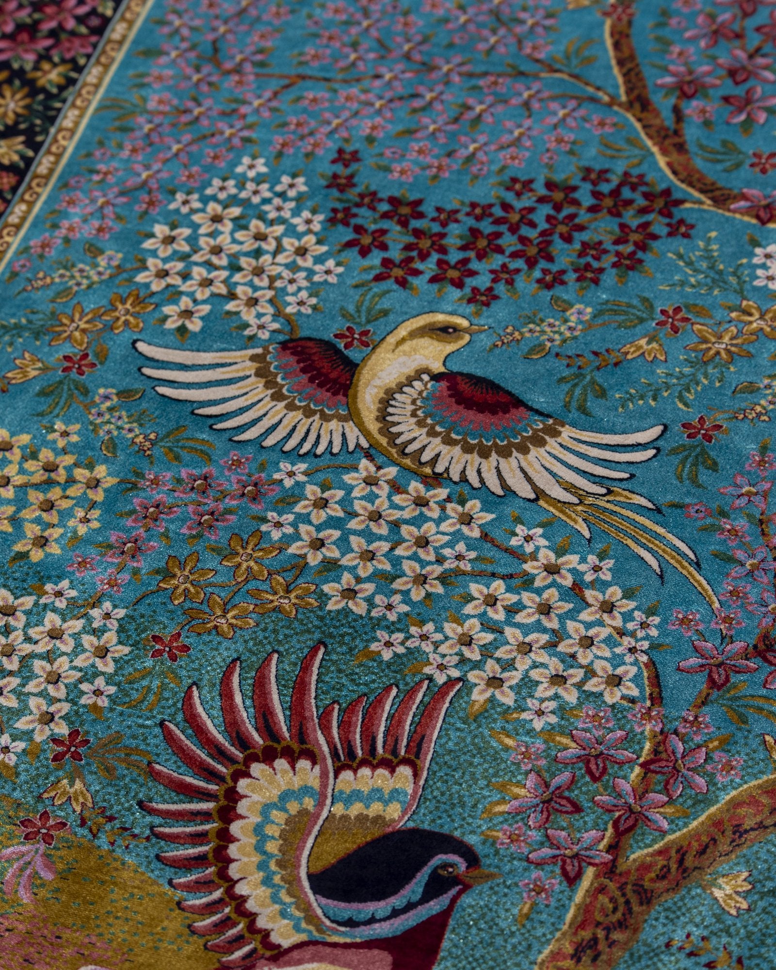 Shahnaz silk carpet angled view showing turquoise tones, 200 x 300 cm - Tabeer Homes Dubai