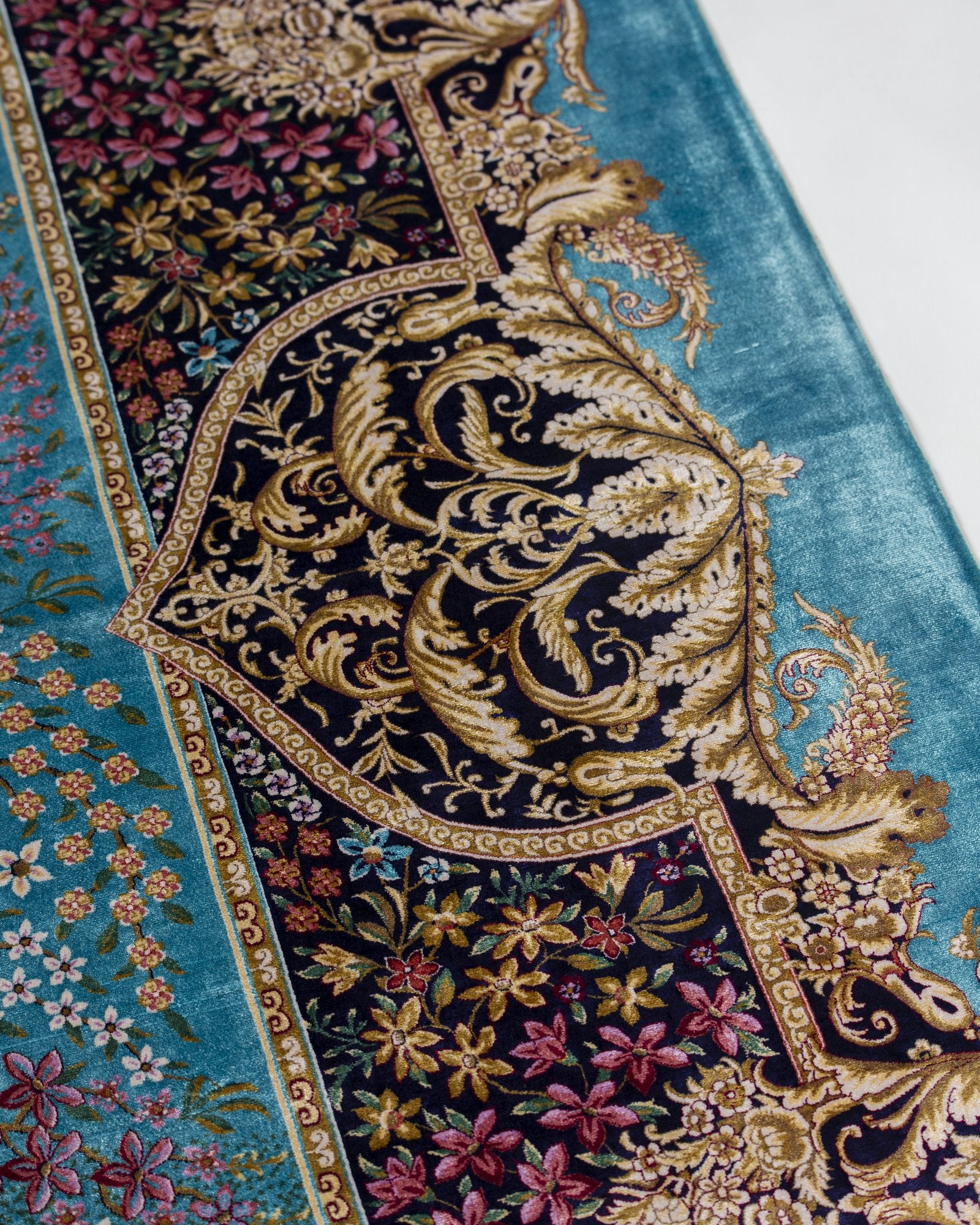 Shahnaz silk carpet floral motif close-up in turquoise, 200 x 300 cm - Tabeer Homes Dubai