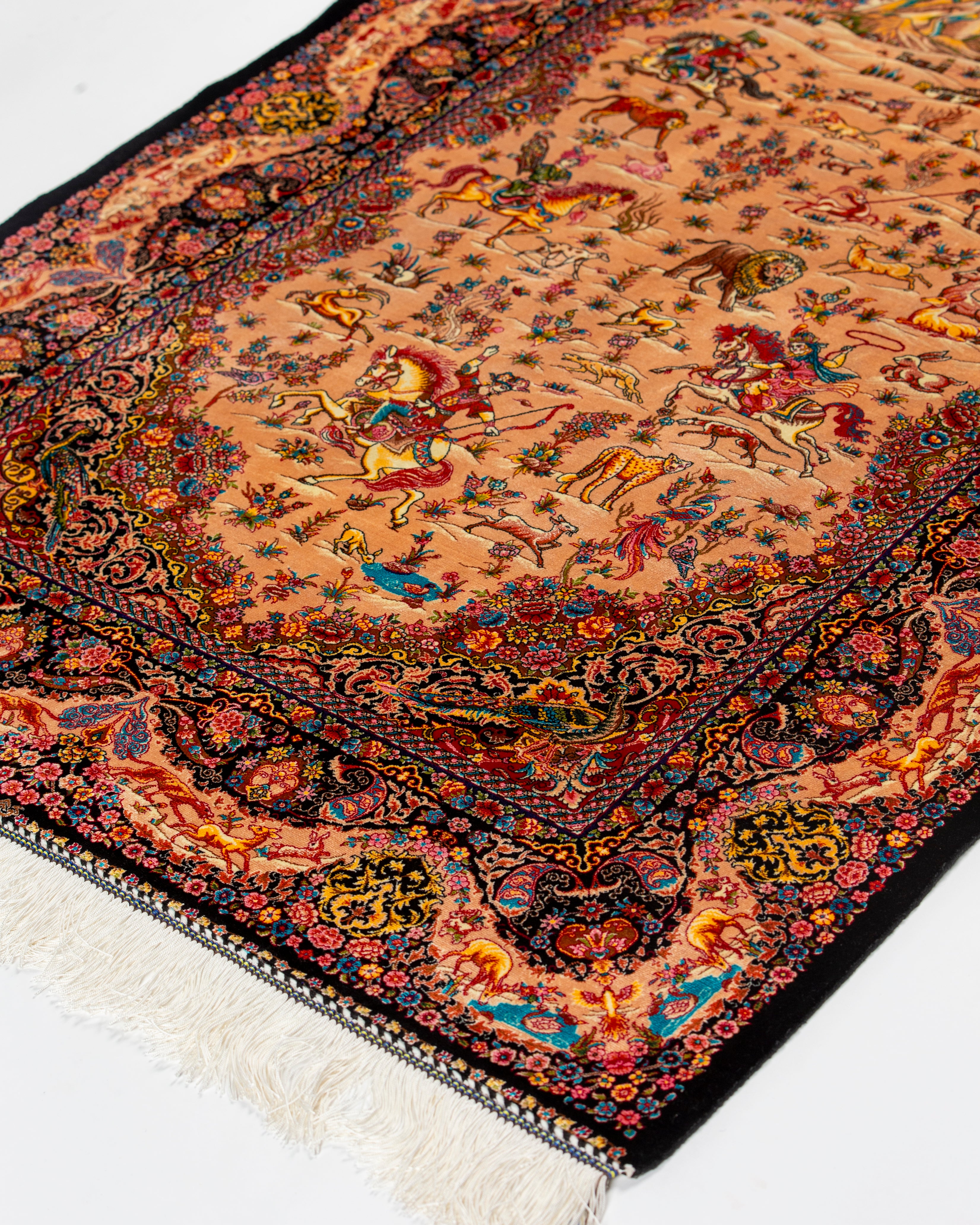 Angled view of the Shirin hunting scene silk rug