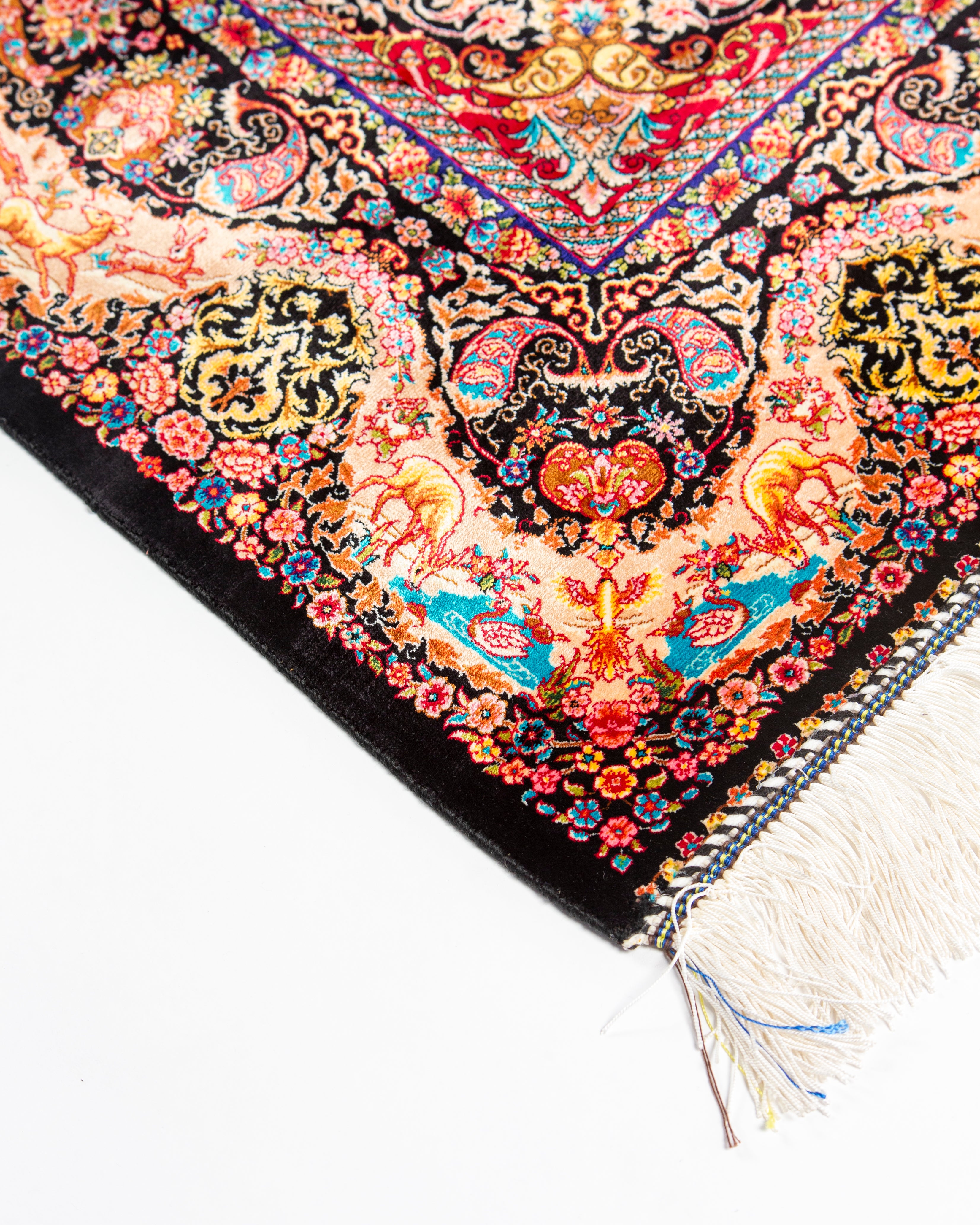 Central scene detail of the Shirin camel silk rug