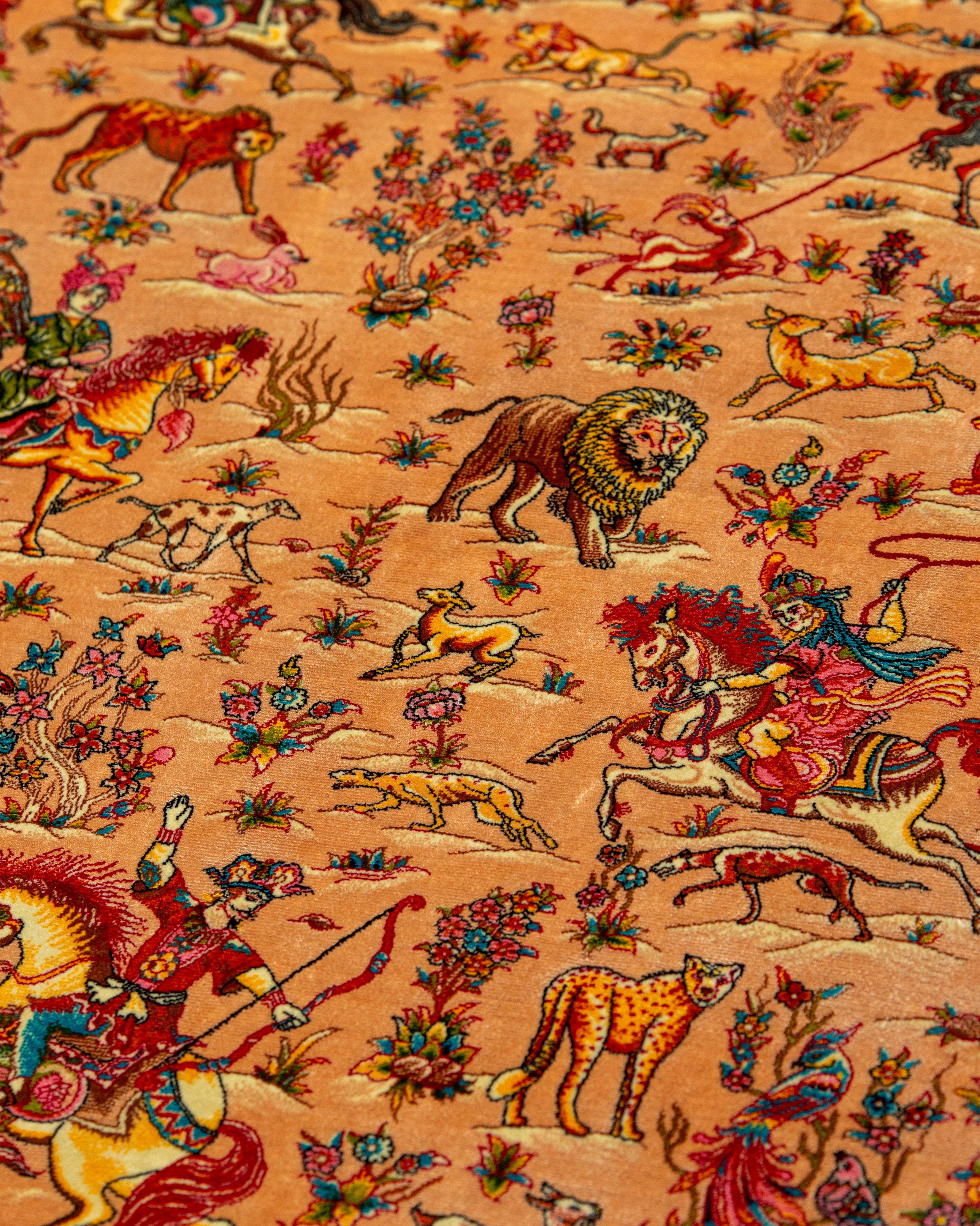 Riders and figures detail on the Shirin silk rug