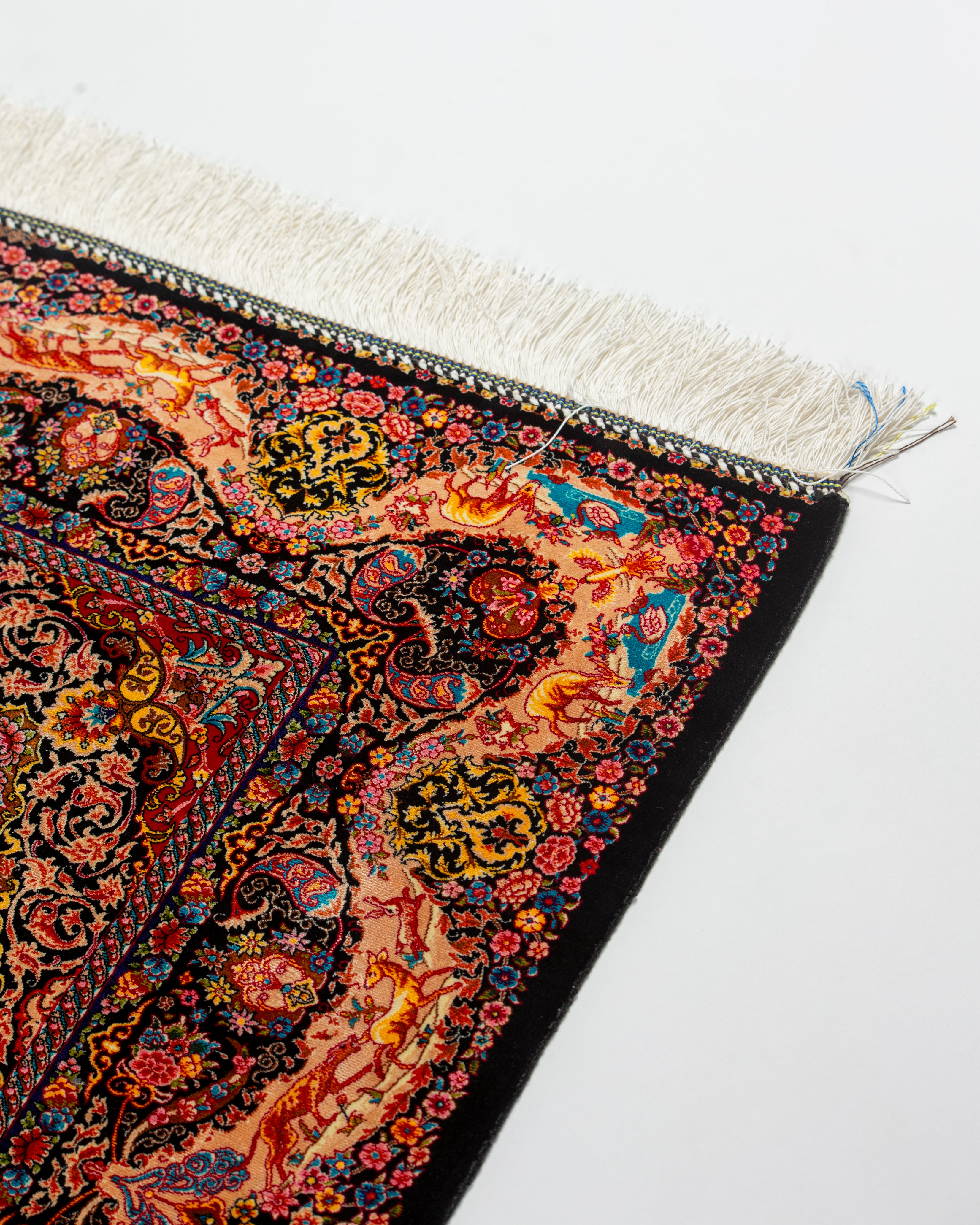 Hunting scene detail of the Shirin camel silk rug