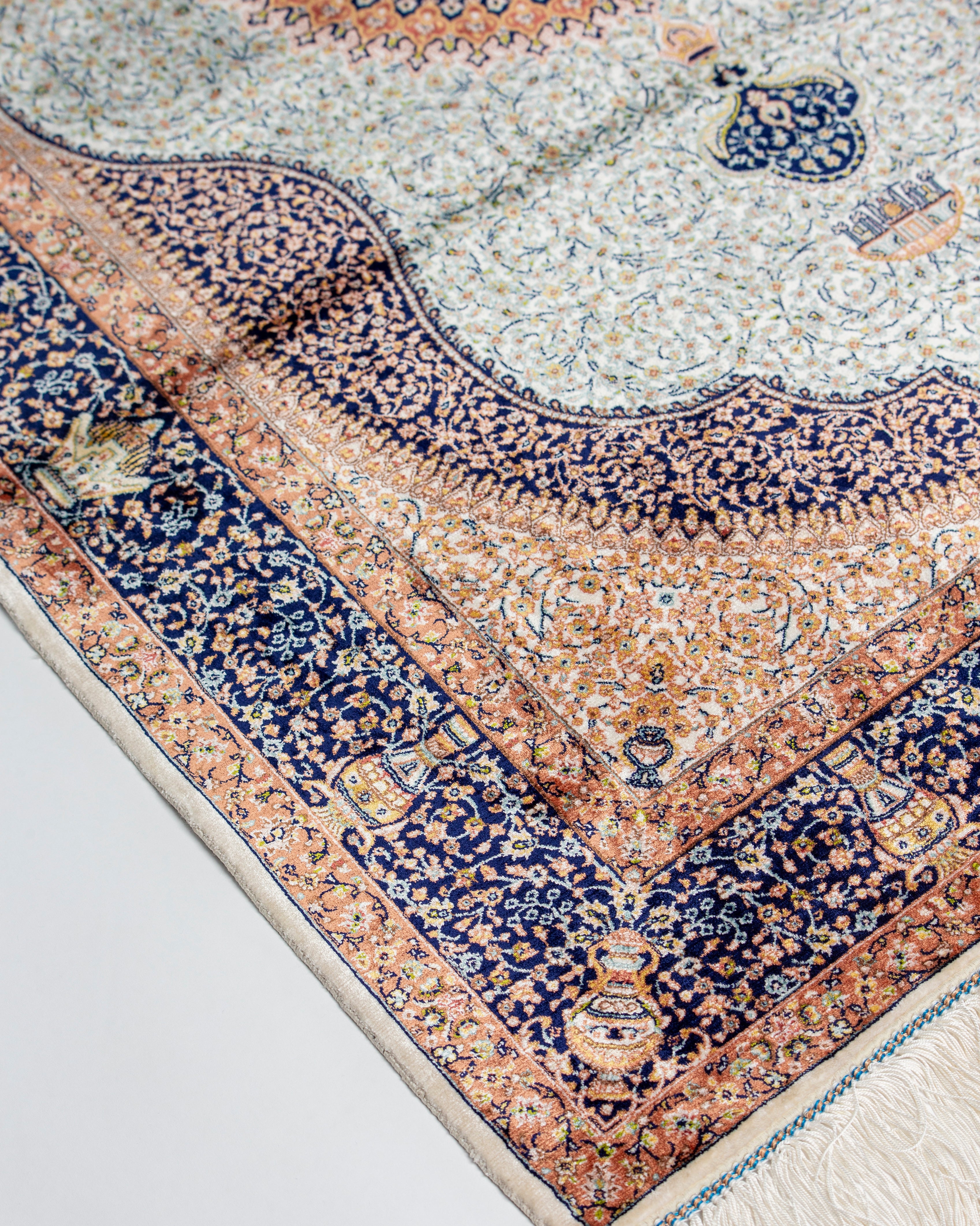 Navy border detail of the Simin ivory silk rug