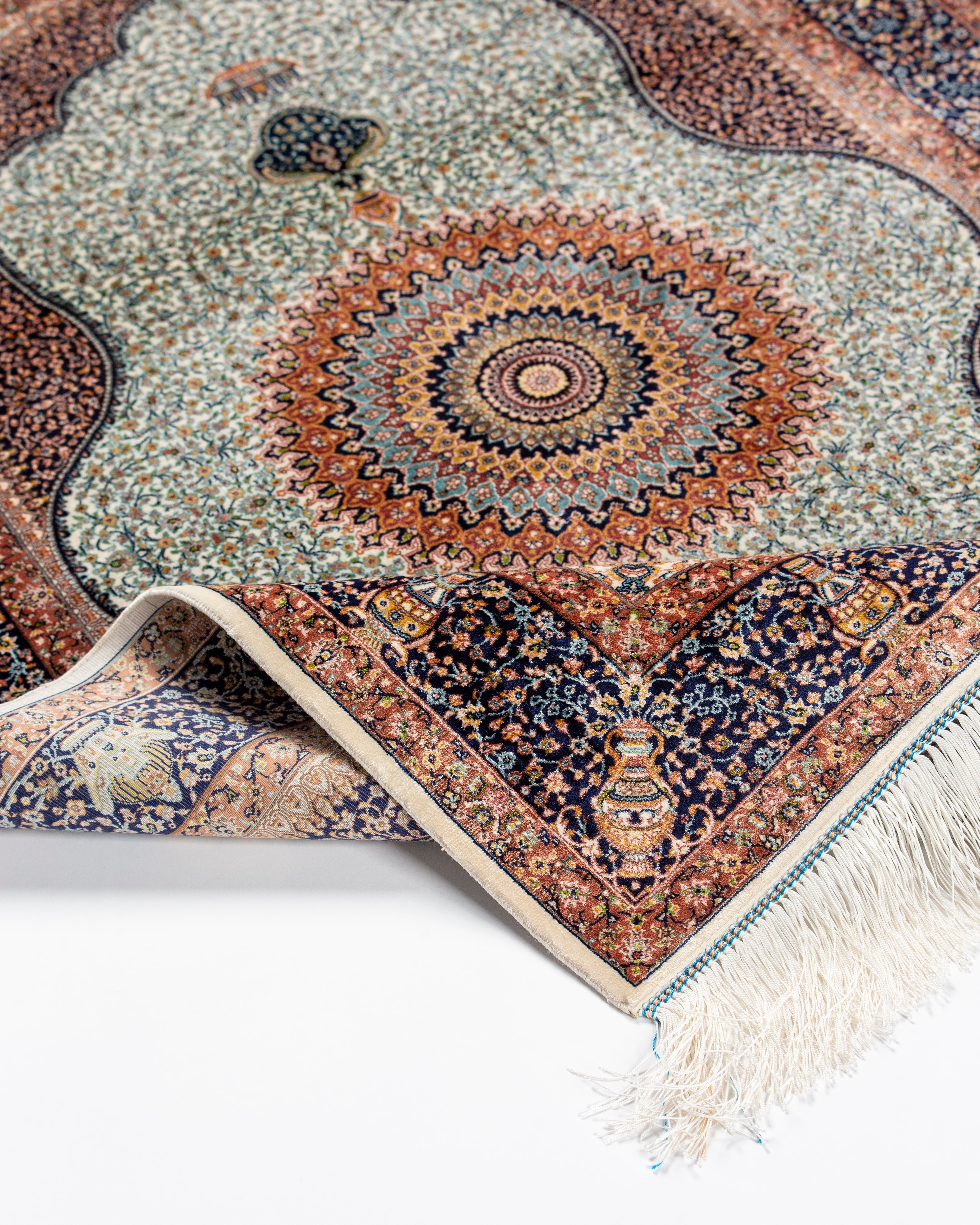 Corner and fringe of the Simin ivory silk rug