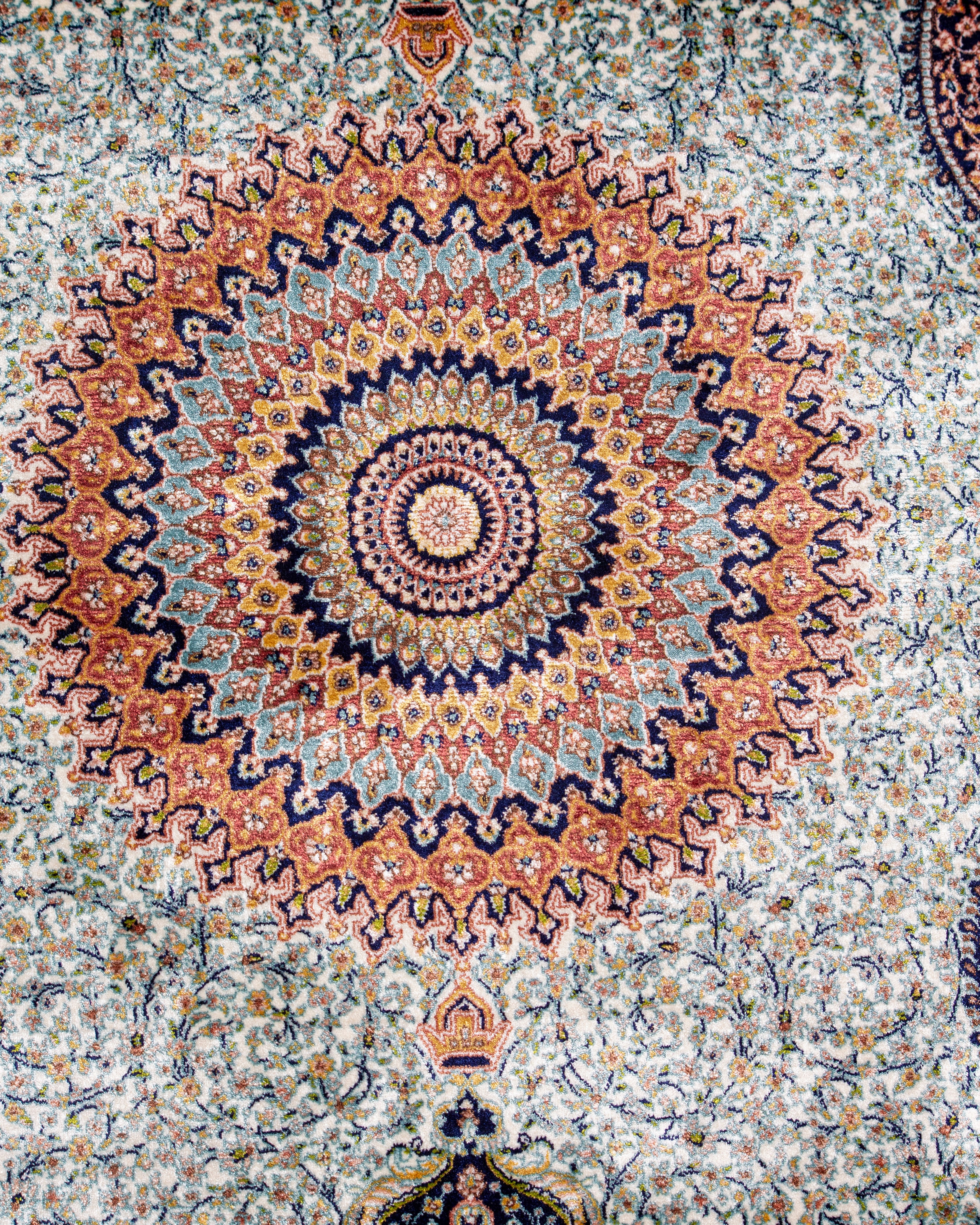 Close up of the starburst medallion on the Simin silk rug