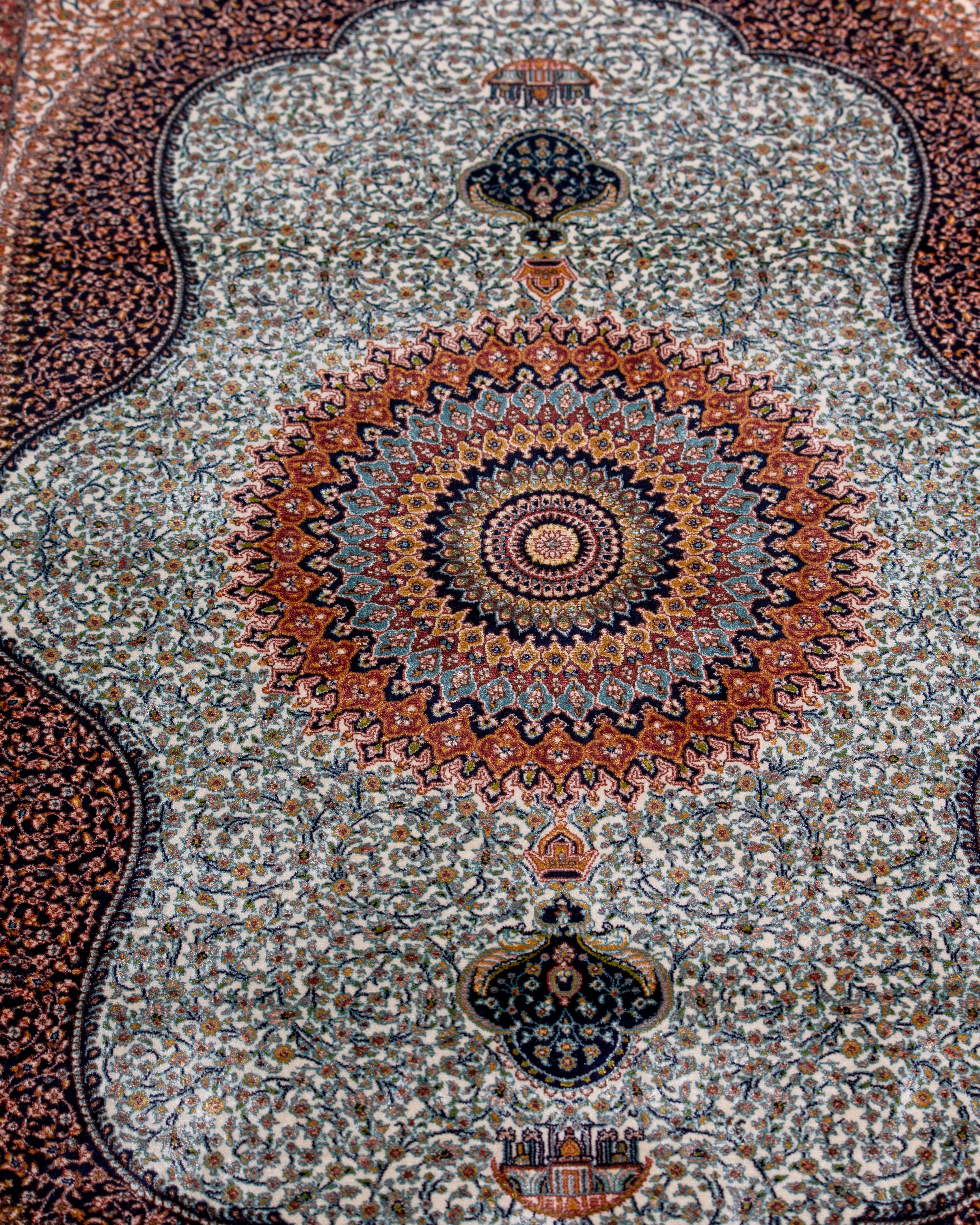Central medallion detail of the Simin ivory silk rug